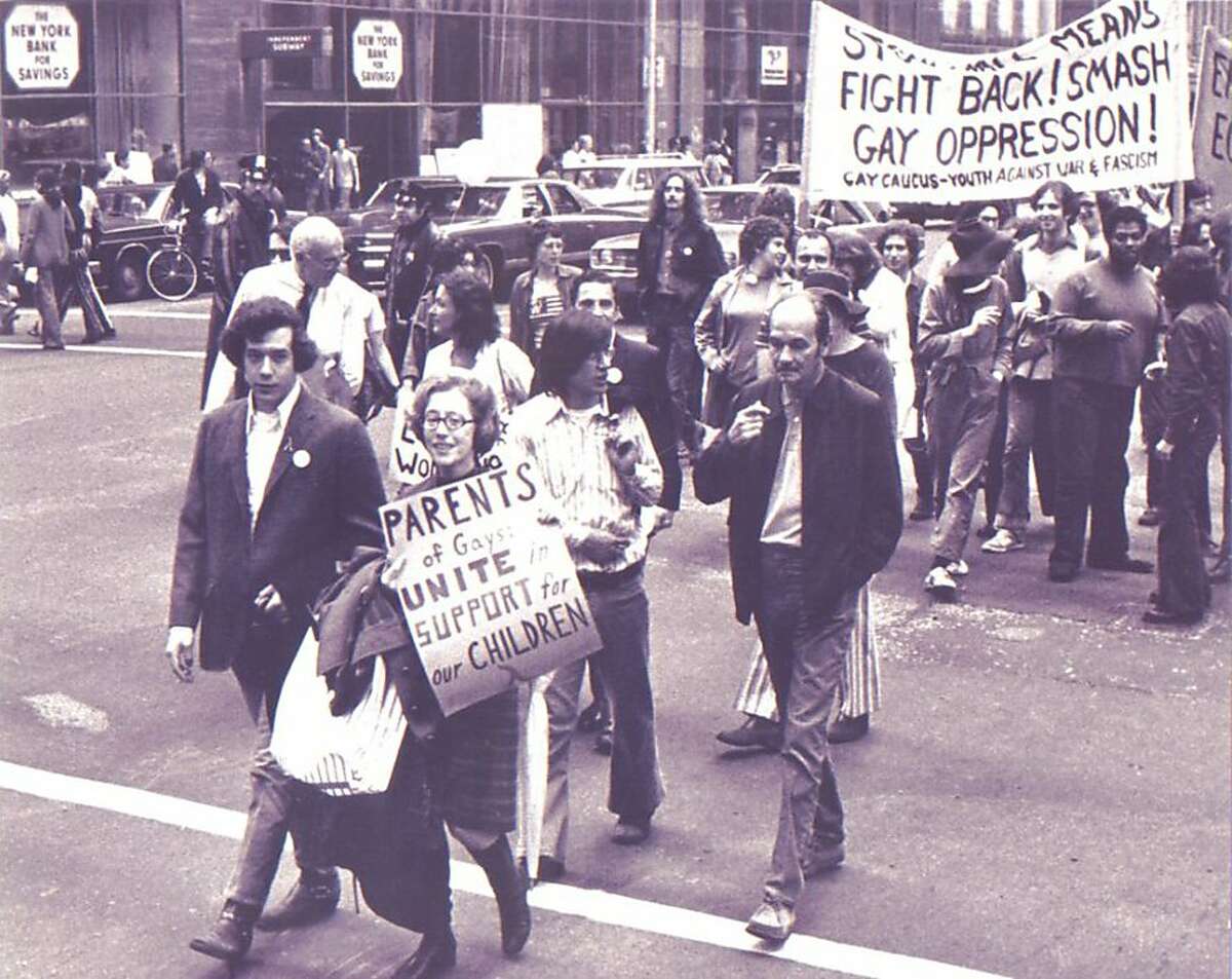 Jeanne Manford, in front, marches alongside her son Morty in a 1972 gay rights parade in New York City.