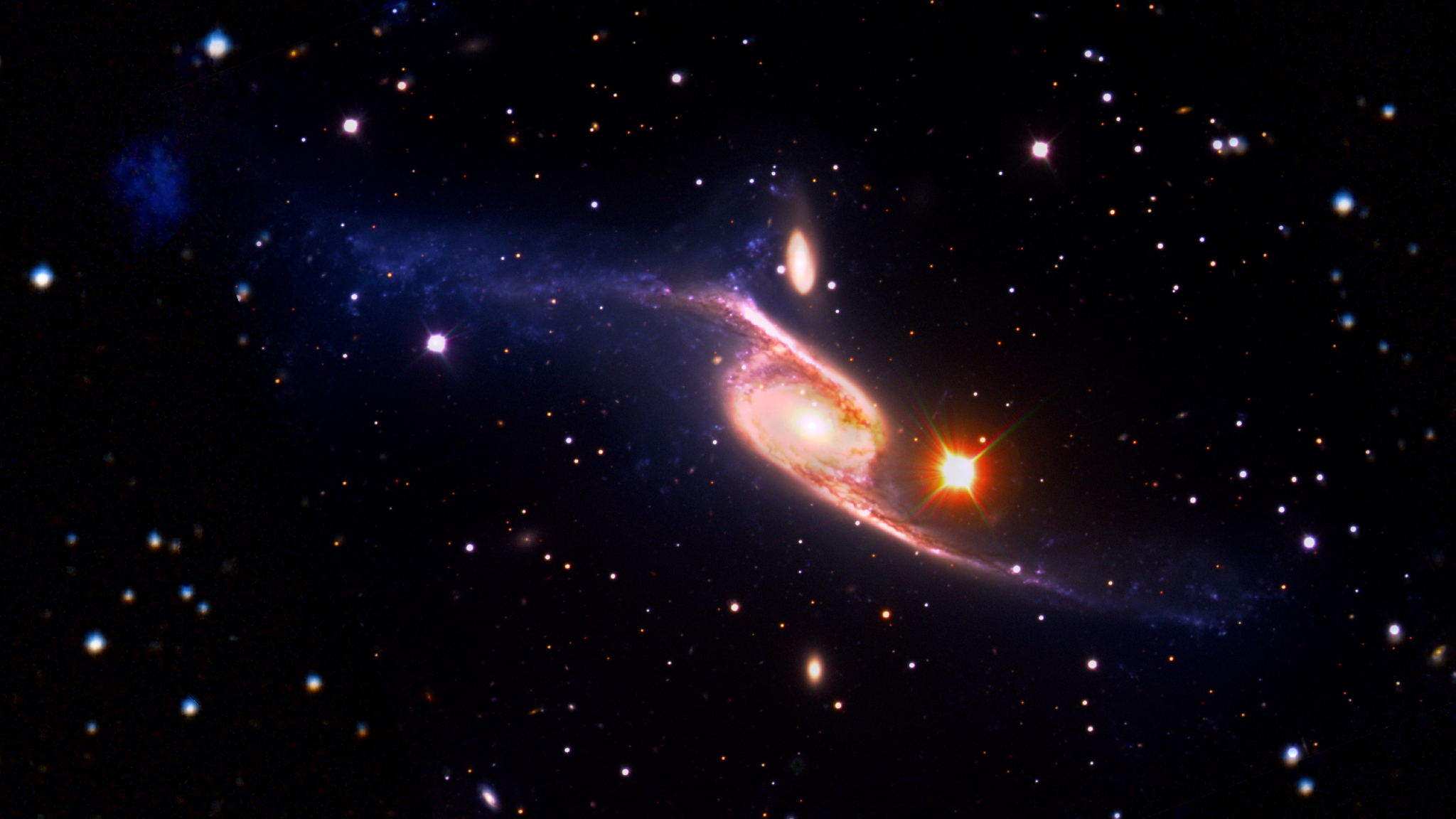 NASA Calls It NGC 6872 Is Largest Known Spiral Galaxy photo 