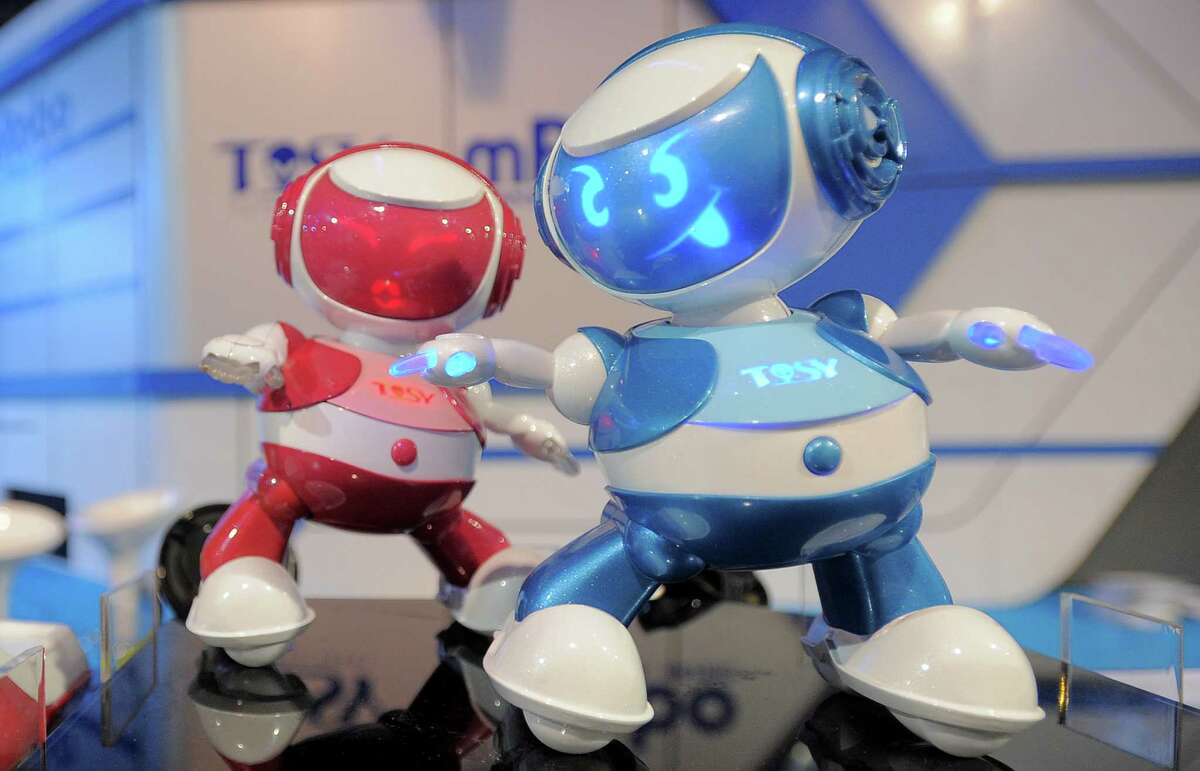 Vietnam's Tosy Disco Robots are displayed at the 2013 International CES at the Las Vegas Convention Center on January 9, 2013 in Las Vegas, Nevada. CES, the world's largest annual consumer technology trade show, runs from January 8-11 and is expected to feature 3,100 exhibitors showing off their latest products and services to about 150,000 attendees.AFP PHOTO / JOE KLAMARJOE KLAMAR/AFP/Getty Images