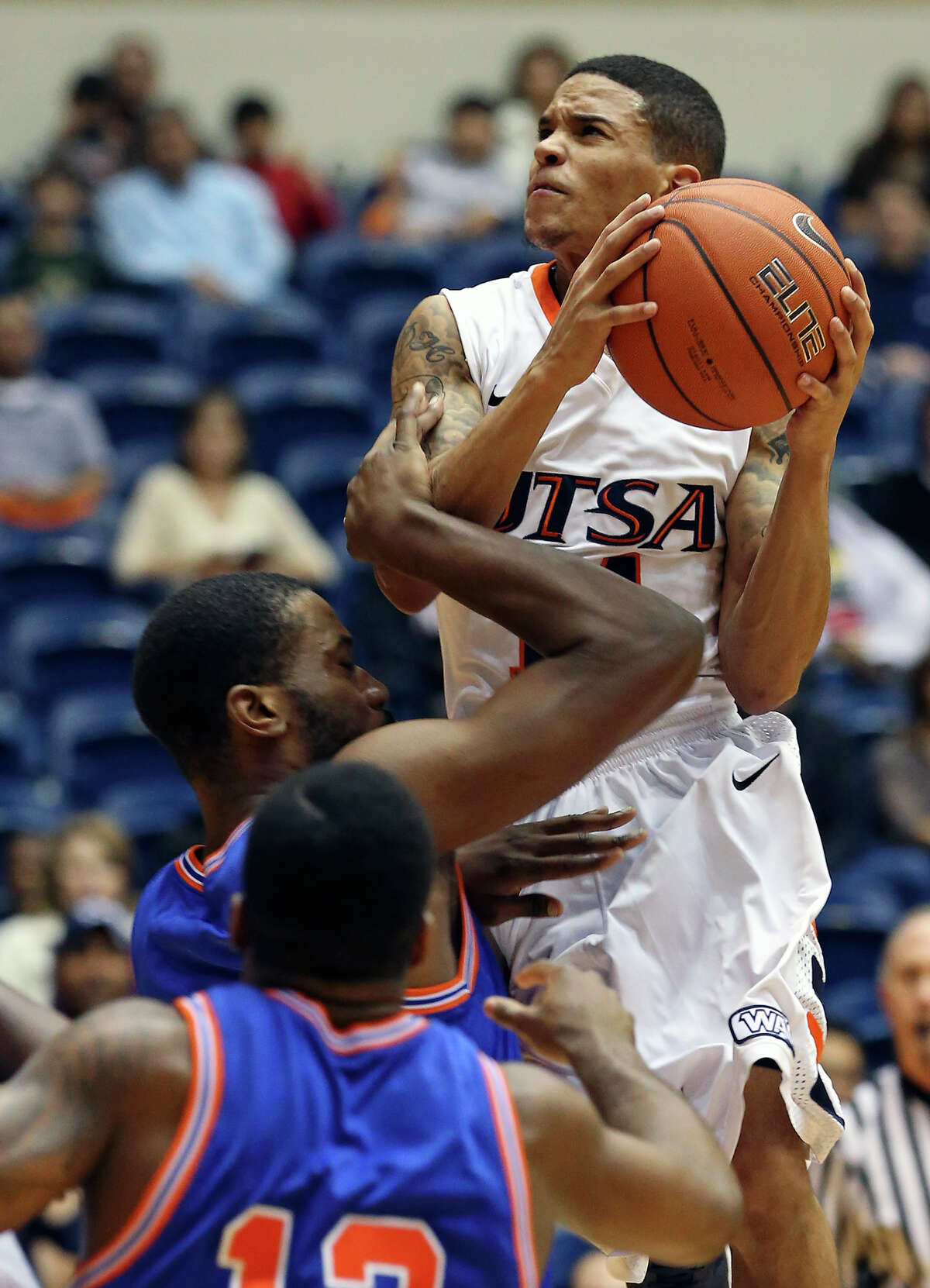 Roadrunner guard Michael Hale III fights up for a shot in the first half as UTSA plays UTA at the UTSA Convocation Center in men's basketball on January 10, 2013.