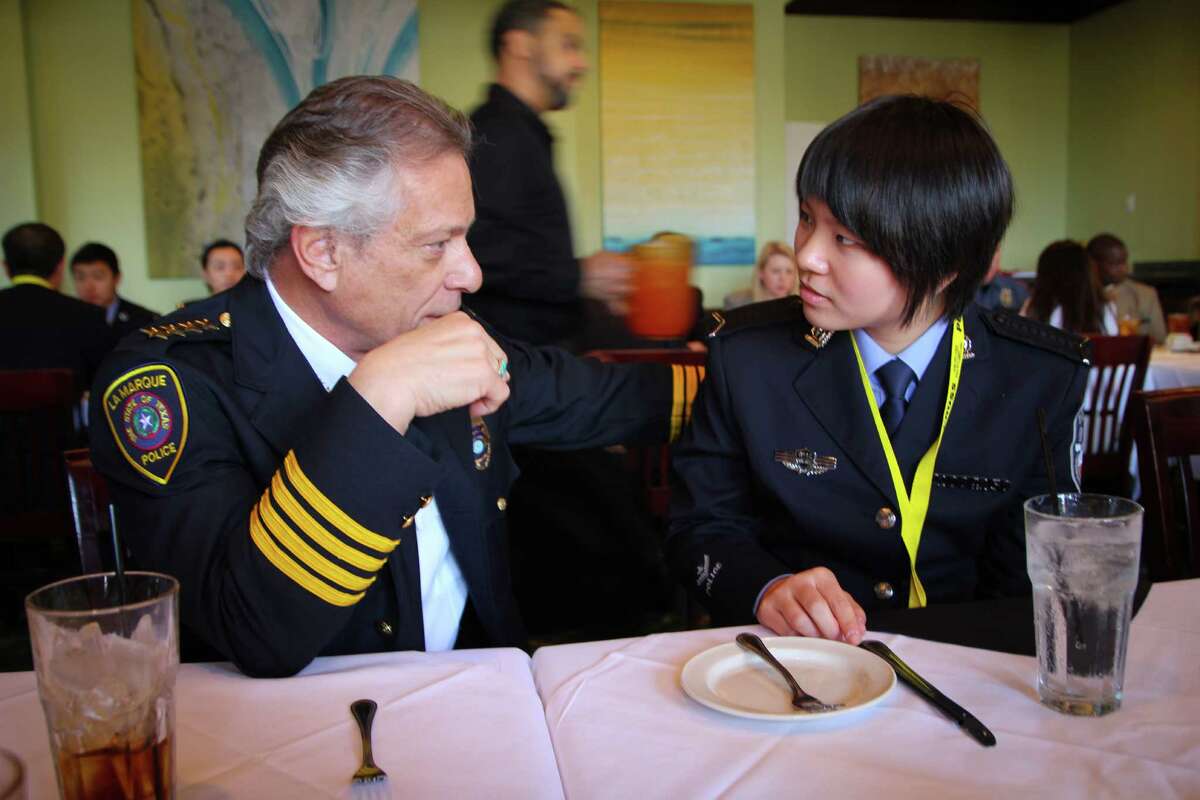 La Marque Police Chief Randall Aragon discusses criminal justice issues with Nuo "Helen" Xu.