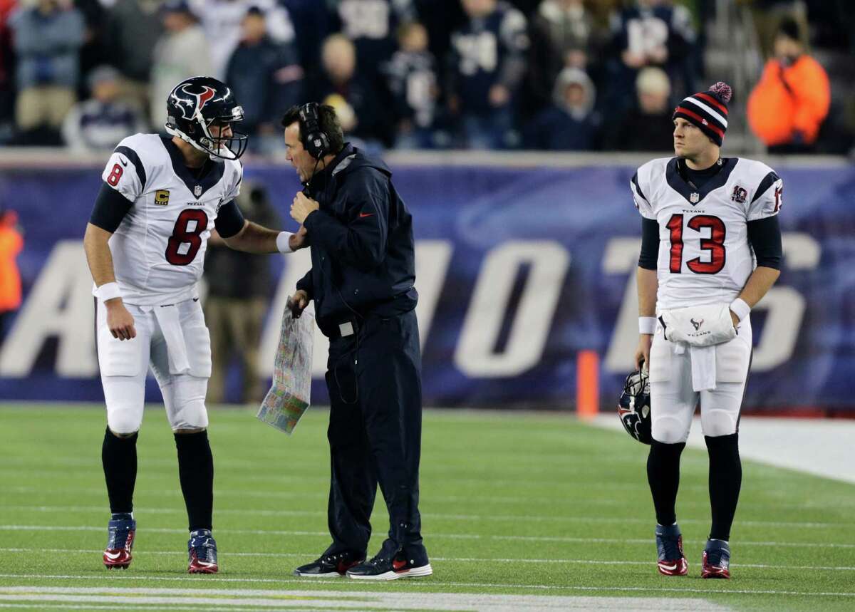 Houston Texans Matt Schaub and head coach Gary Kubiak talk in a