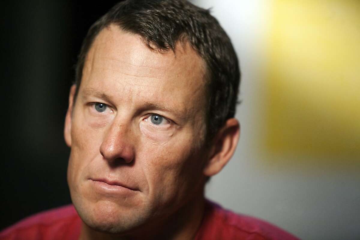 FILE - In this Feb. 15, 2011 file photo, Lance Armstrong pauses during an interview in Austin, Texas. In 2012, Armstrong decided to give up the battle against doping charges, saying "enough is enough" but acknowledging no wrongdoing. The move began his swift fall from being perhaps the nation's best-known cancer-fighting hero, and though he maintains he was victimized by a "witch hunt" he was still stripped of all seven of his Tour de France victories. (AP Photo/Thao Nguyen, File)