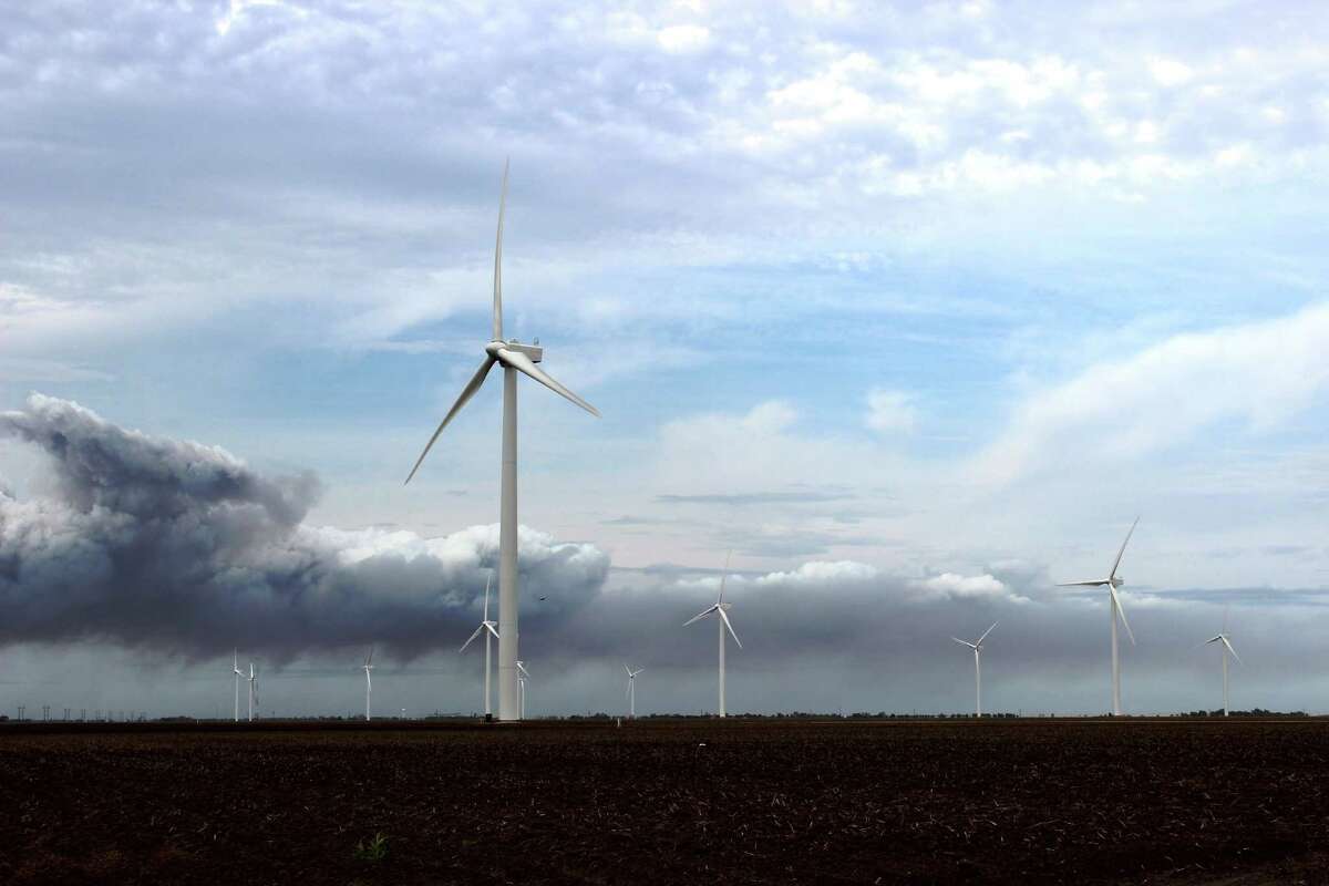 Storm clouds approach Duke Energy's Los Vientos I wind farm in Willacy County on Dec. 30. CPS Energy is buying 200 megawatts of wind-generated power from Los Vientos under a 25-year agreement. Source: courtesy photo / CPS Energy