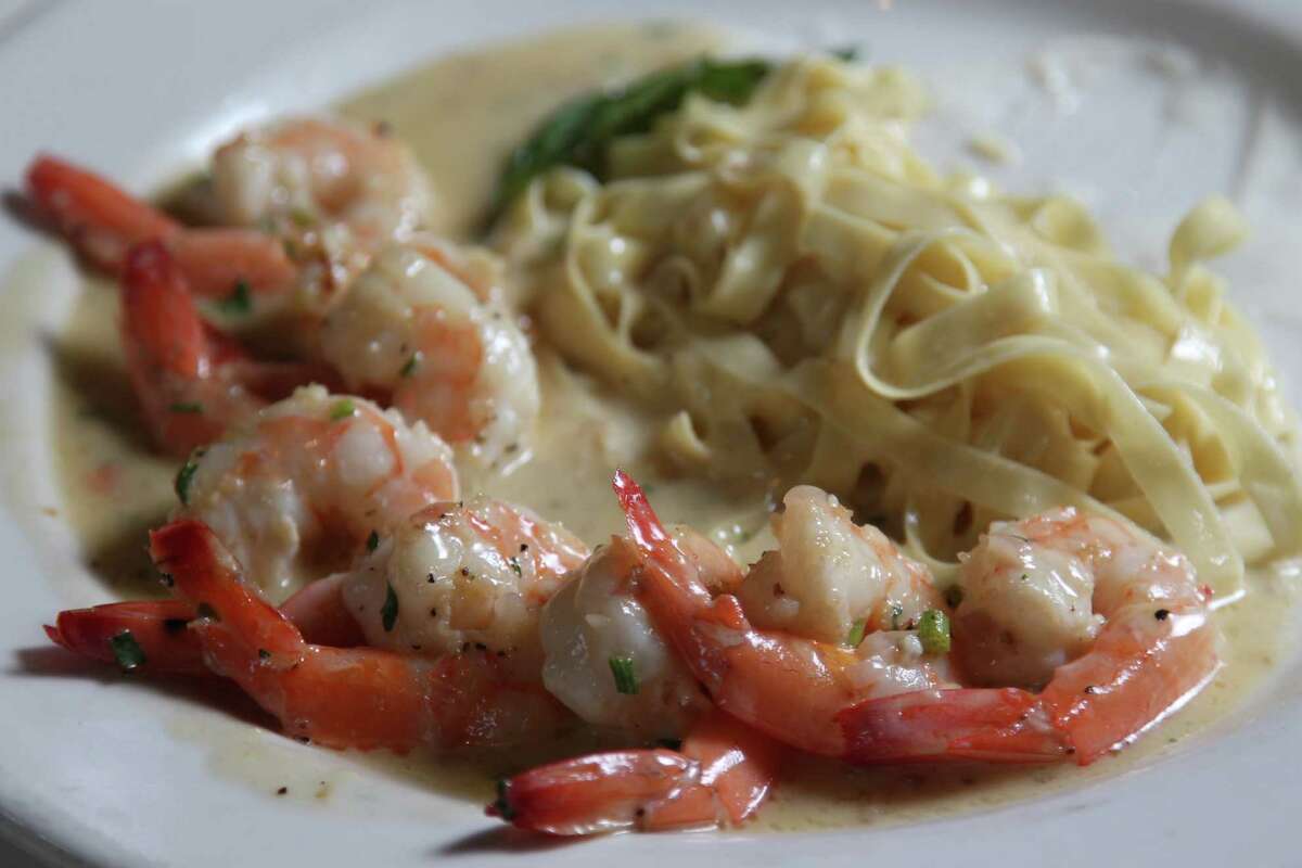 Shrimp Damian, sautéed with garlic, white wine and butter and served with fettuccine alfredo, is served at Damian's Cucina Italiana.