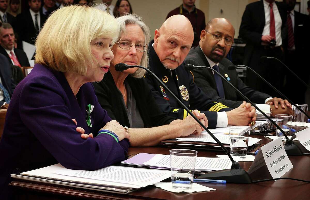 (L-R) Superintendent of schools of Newtown, Connecticut, Janet Robinson, Emily Nottingham, mother of Gabe Zimmerman, a staff member to former Rep. Gabrielle Giffords' who was killed during the Tucson, Arizona shootings, chief of police for the City of Chaska, Minnesota, Scott Knight, and Philadelphia Mayor Michael Nutter testify during a hearing before the House Democratic Steering and Policy Committee January 16, 2013 on Capitol Hill in Washington, DC. The committee held a hearing to focus on "Gun Violence Prevention: A Call to Action."