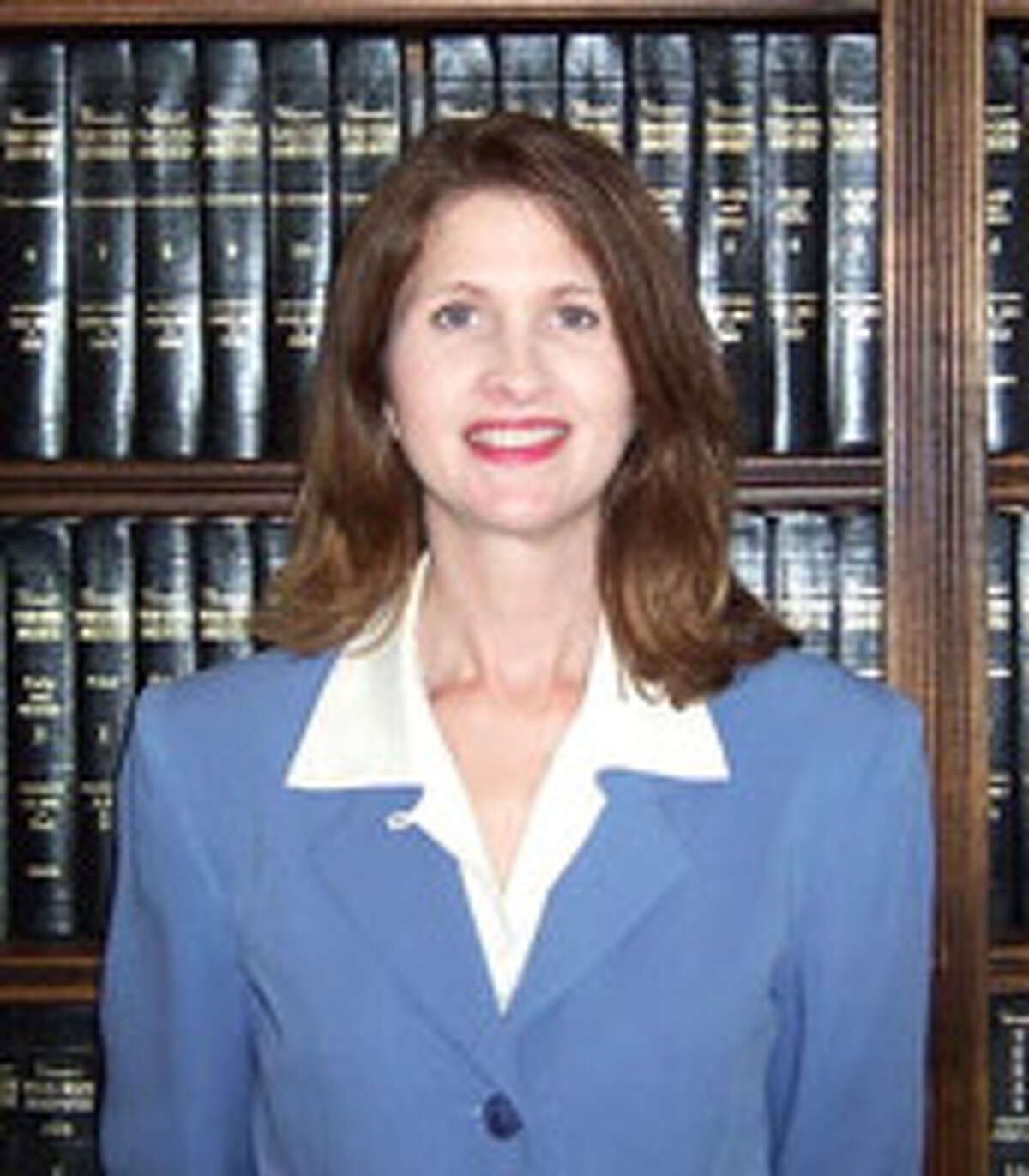 Judge Elizabeth E. Coker oversees the 258th district court that covers Polk, San Jacinto and Trinity counties. Coker is accused of the "very unethical" practice of sending text messages from the bench to an assistant district attorney to help bolster the prosecution's case during a trial, according to an investigator's report. Credit: Trinity County
