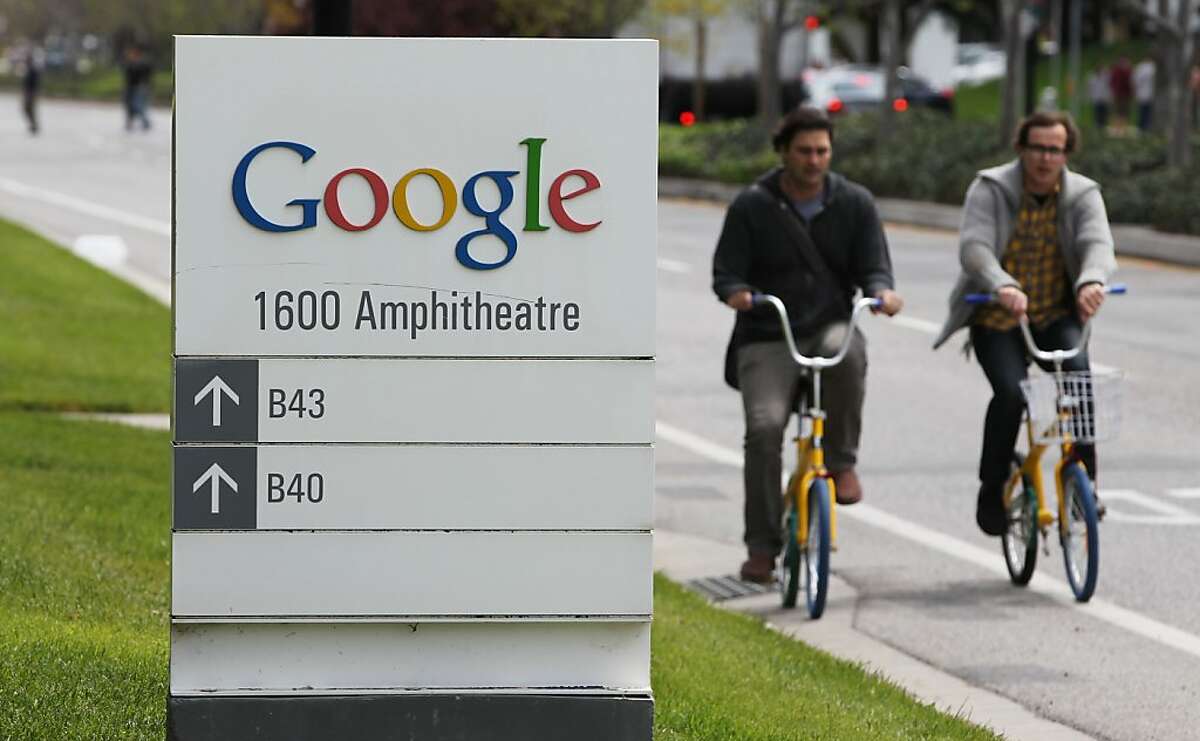 Google workers ride bikes outside of Google headquarters in Mountain View, Calif., Thursday, April 12, 2012. Google Inc. said Thursday that it earned $2.89 billion, or $8.75 per share, in the first quarter. That's up from $1.8 billion, or $5.51 per share, a year earlier. (AP Photo/Paul Sakuma)