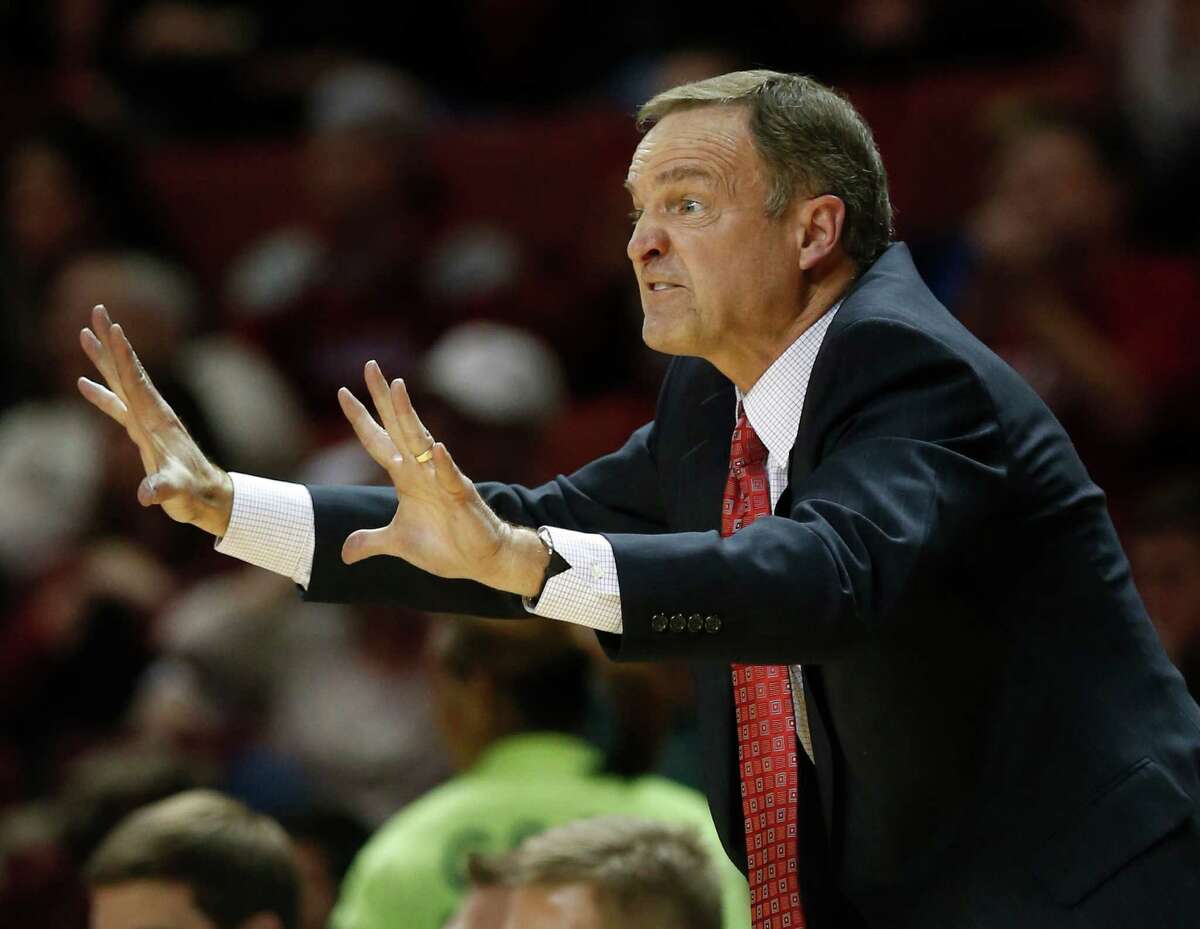 Okahoma head coach Lon Kruger gestures to his team during the second half of an NCAA college basketball game against Oklahoma State in Norman, Okla., Saturday, Jan. 12, 2013. Oklahoma won 77-68. (AP Photo/Sue Ogrocki)