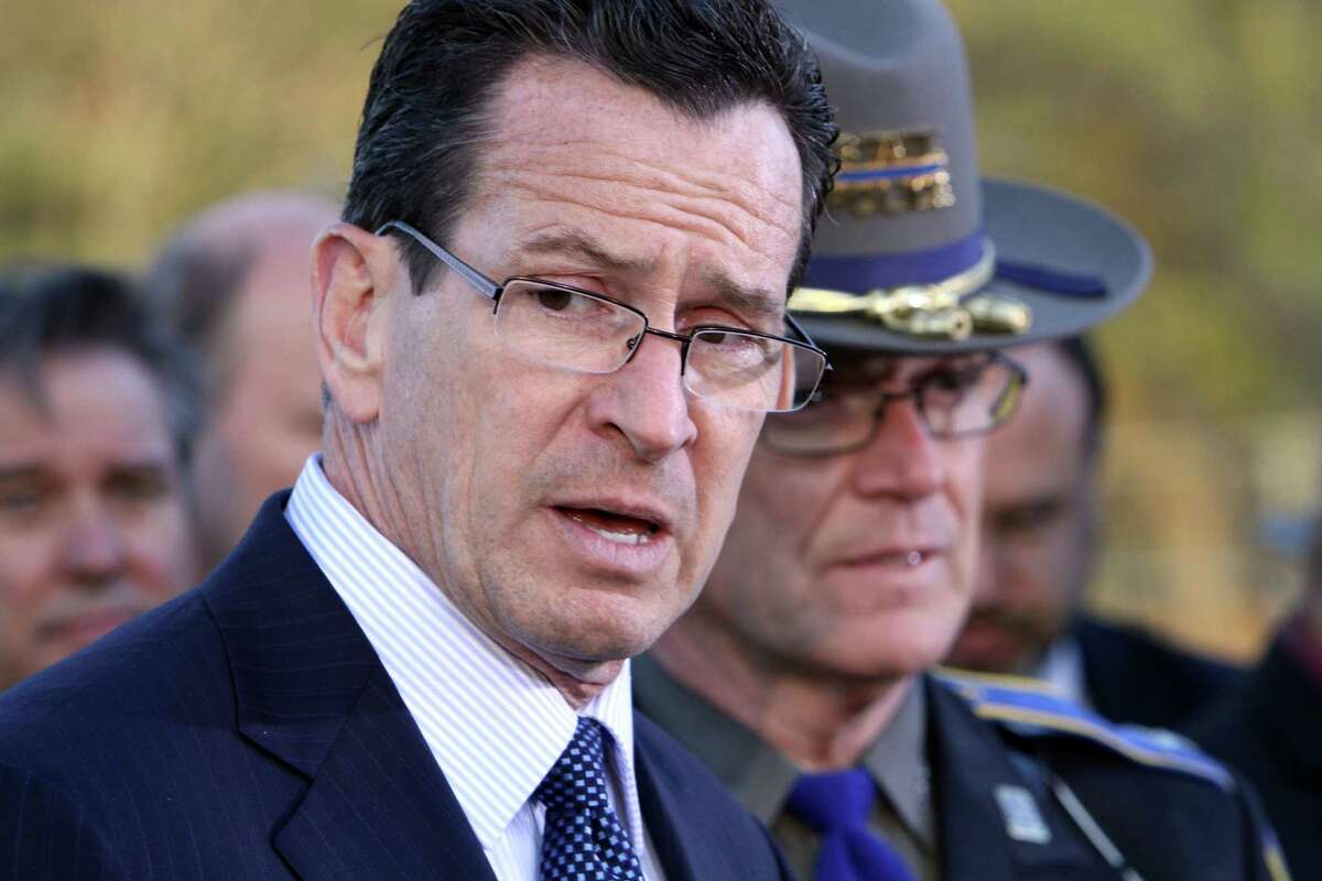 Connecticut Gov. Dannel Malloy speaks at a news conference on the shooting at Sandy Hook Elementary school, where a gunman opened fire, killing 26 people, including 20 children, Friday, Dec. 14, 2012, in Newtown, Conn. (AP Photo/The Journal News, Frank Becerra Jr.) MANDATORY CREDIT, NYC OUT, NO SALES, TV OUT, NEWSDAY OUT; MAGS OUT