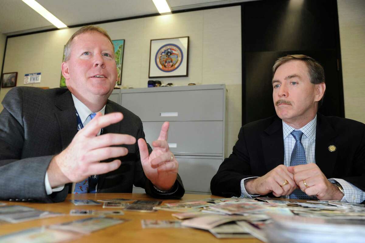 Director Owen McShane, left, and Executive Deputy Commissioner J. David Sampson talks about changes to state drivers licenses on Wednesday, Jan. 9, 2013, at New York State Department of Motor Vehicles in Albany, N.Y. (Cindy Schultz / Times Union)