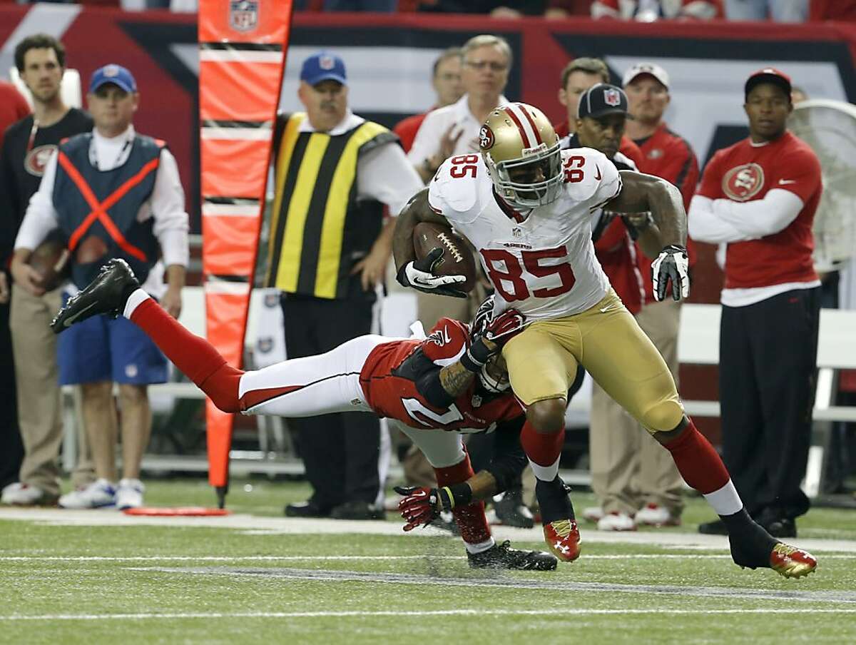 San Francisco 49ers' Michael Crabtree (15) and Vernon Davis (85