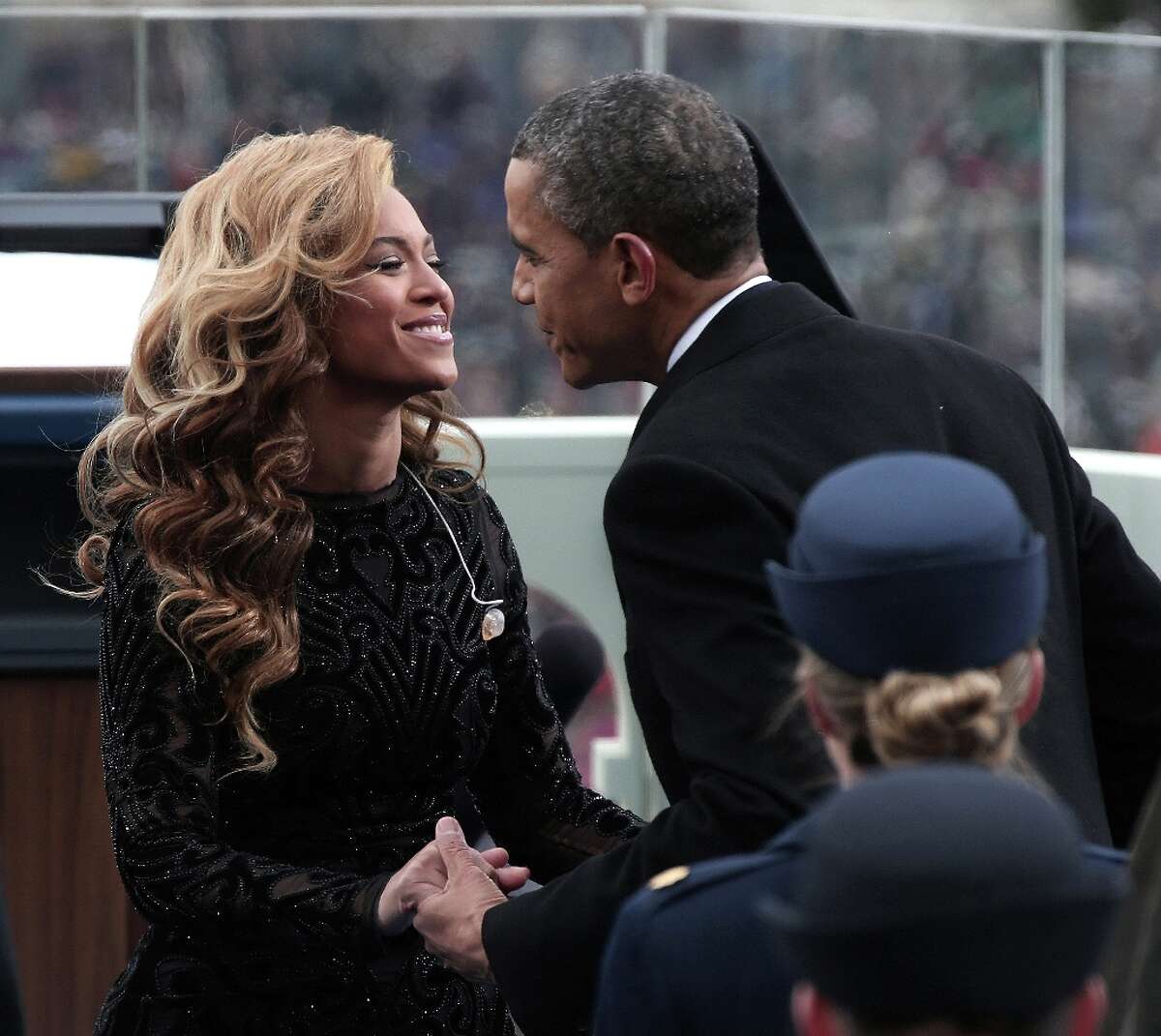 U.S. President Barack Obama greets singer Beyonce after she performs the National Anthem during the public ceremonial inauguration on the West Front of the U.S. Capitol January 21, 2013 in Washington, DC. Barack Obama was re-elected for a second term as President of the United States.