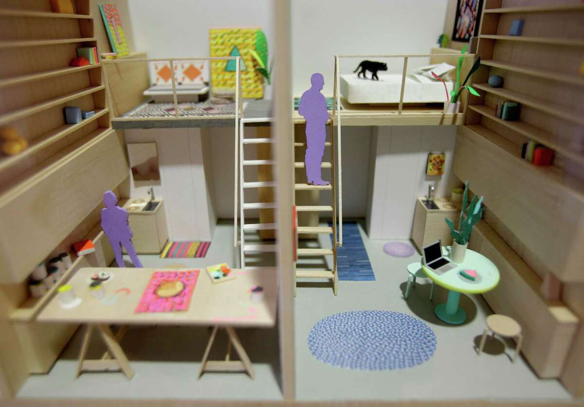 A model of micro-apartments are displayed at an exhibit called "Making Room: Models for Housing New Yorkers" at the Museum of the City of New York in New York, Tuesday, Jan. 15, 2013. The exhibit grew out of the city's PlaNYC, which projected the city's population will grow by about 600,000 people by 2030.