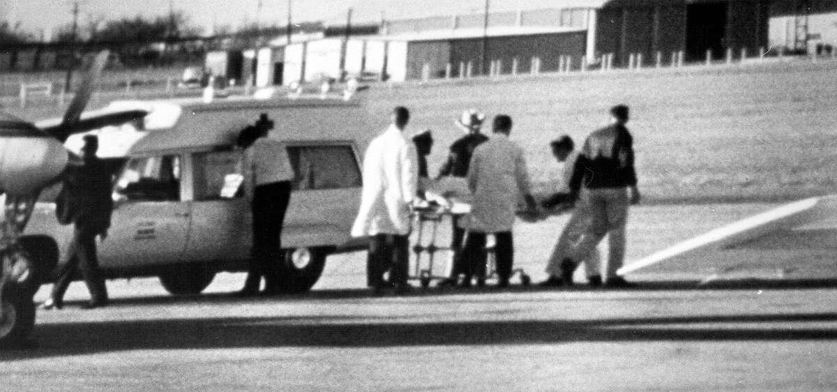 The body of former President Lyndon Johnson is placed in an Army ambulance at the San Antonio International Airport January 22, 1973.