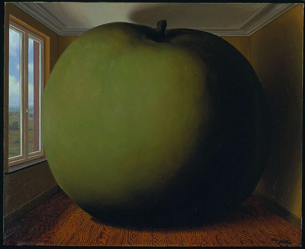 René Magritte's paintings, like "La Chambre d'Écoute (The Listening Room)" from 1952, "make you feel the sound has been sucked out of the room," says Lucinda Barnes, BAM's chief curator. Artists Rights Society (ARS)