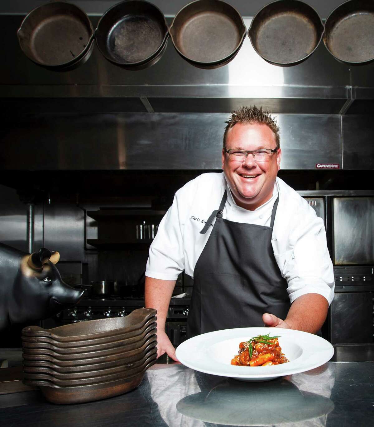 Chris Shepherd, owner and executive chef of Underbelly, poses for a portrait inside his restaurant, Friday, Sept. 21, 2012, in Houston. ( Michael Paulsen / Houston Chronicle )