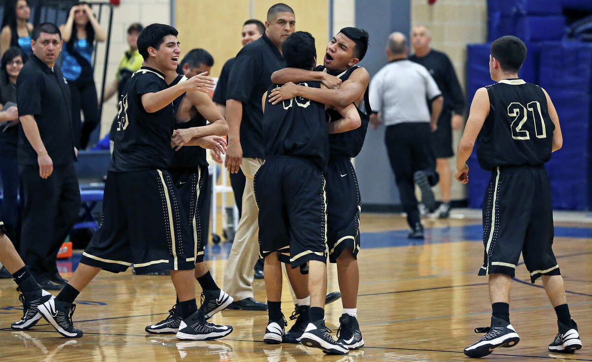 The Bears celebrate victory as Lanier hosts Edison in boys basketball at Lanier on January 22, 2013.