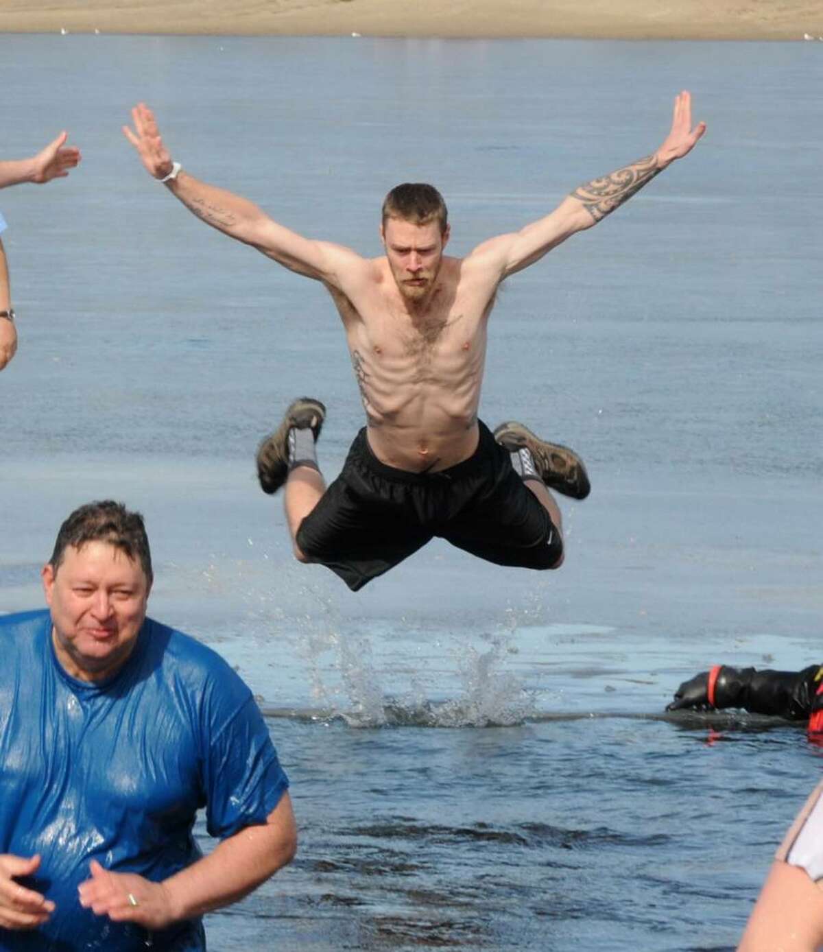 Jack Knapp Sr. Danbury Dip for Charity. Members of the Moose Lodge jump into chilly Lake Kenosia on Saturday to raise money for charity. L, Jack Knapp Jr. (the founders son) wades out of the water and R, John Webber III takes the dive. February 2009