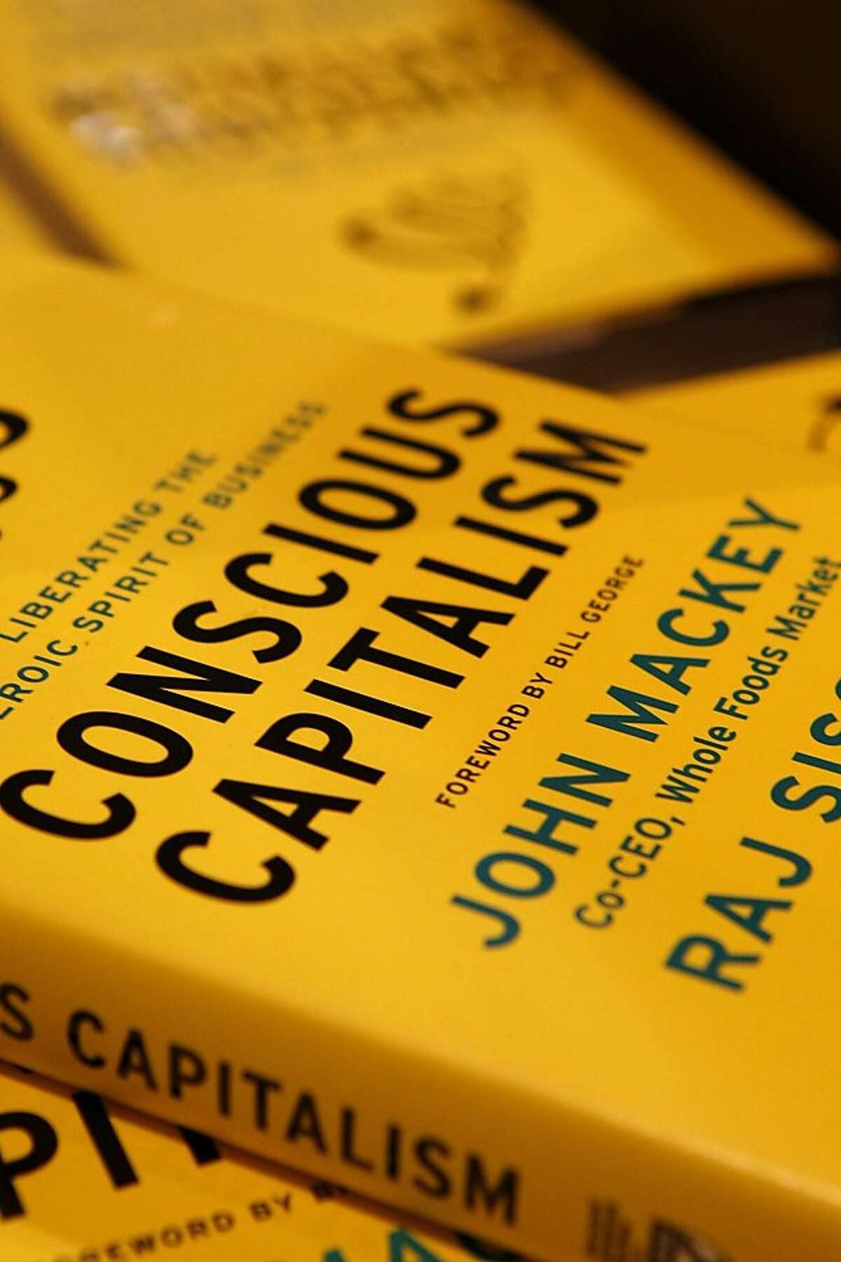 John Mackey's new book, "Conscious Capitalism: Liberating the Heroic Spirit of Business" at the Whole Foods in Potrero on January 22, 2013 in San Francisco, Calif. Mackey is both co-founder and co-CEO of the Whole Foods supermarket chain.