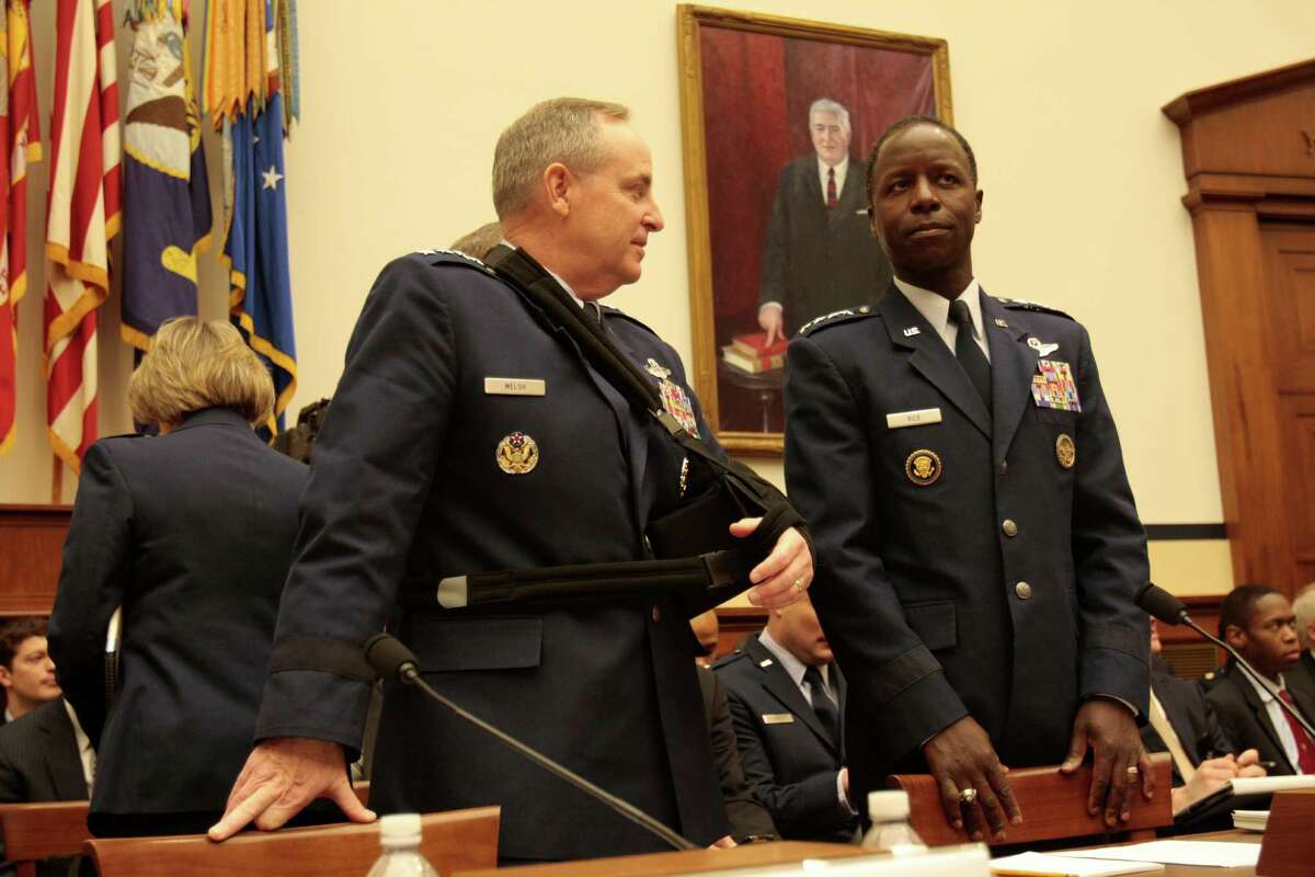 WASHINGTON, DC - January 23 - General Mark A. Welsh III, USAF, Chief of Staff, USAF at left and General Edward A. Rice, Jr., USAF, Commander, Air Education and Training Command, USAF wait for hearing to resume on review of sexual misconduct by basic training instructors at Lackland Air Force Base by House Armed Services Committee, 2118 Rayburn Building.