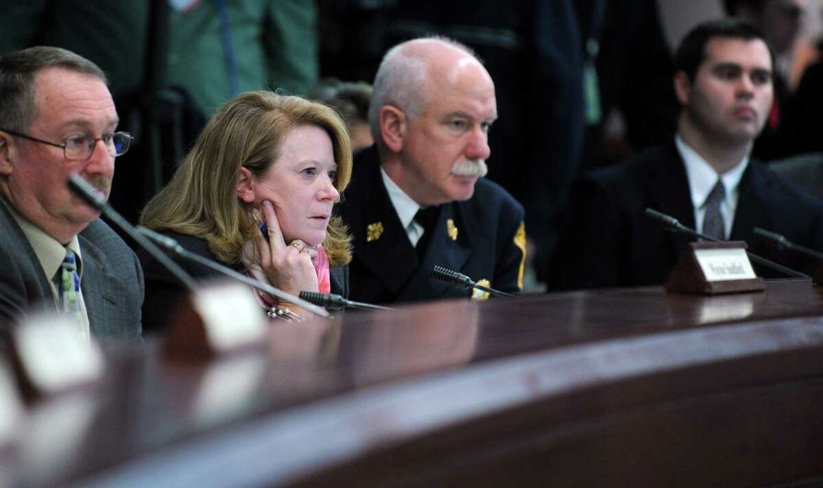 University of Connecticut Chief of Police Barbara O'Connor listens to testimony from former Colorado Governor Bill Ritter, a member of the Columbine Commission, during the first meeting of the Sandy Hook Advisory Commission Thursday, Jan. 24, 2013 at the Legislative Office Building in Hartford, Conn.