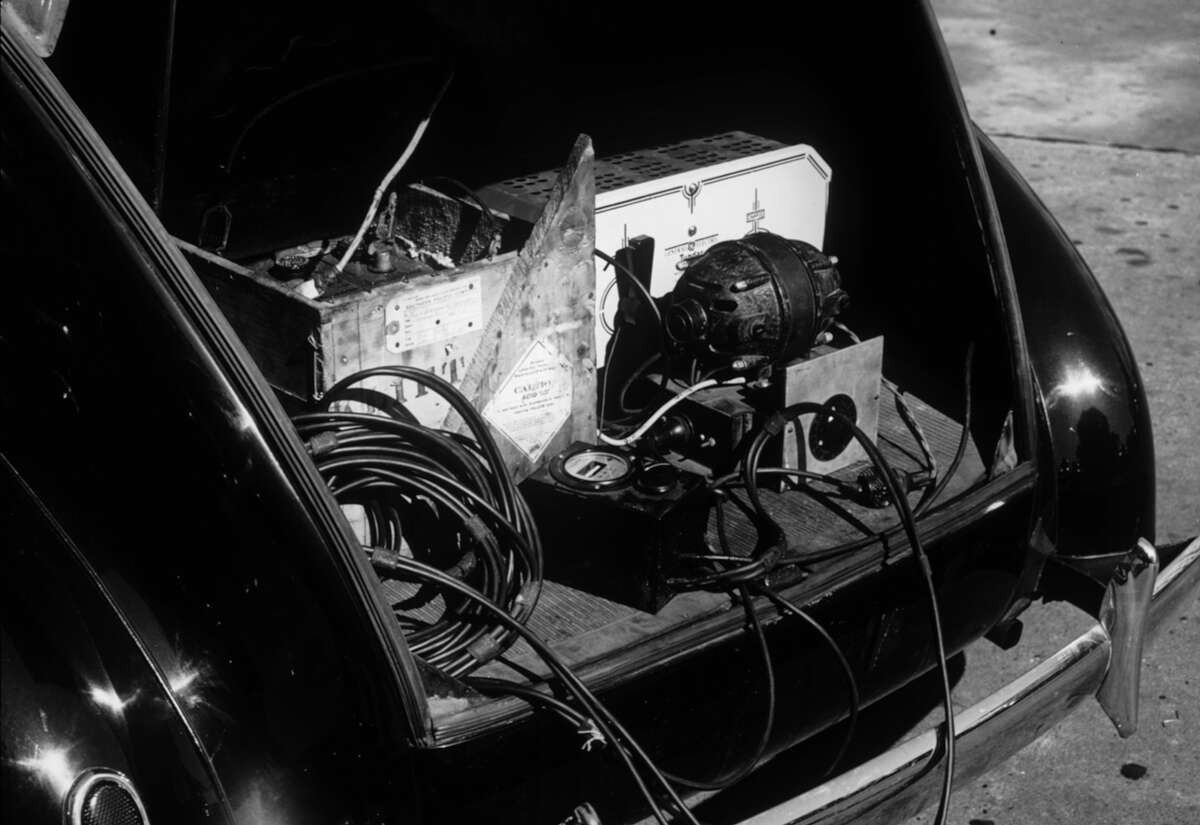 Alan Lomax's car trunk with recording equipment, 1930s.