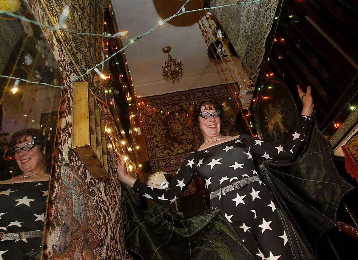 Louise Jarmilowicz descends the staircase of her flat Monday January 22, 2013. Louise Jarmilowicz is a seamstress and costume designer who has done many costumes for various local theatres in San Francisco, Calif.