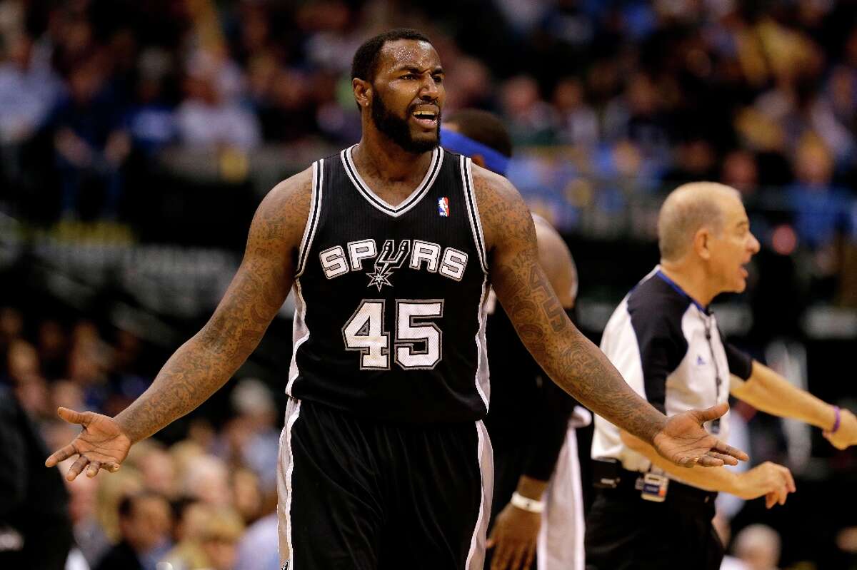 San Antonio Spurs' DeJuan Blair (45) reacts after being charged with a foul on a dunk in the first half of an NBA basketball game against the Dallas Mavericks, Friday, Jan. 25, 2013, in Dallas. The charge was retracted by officials after a short delay in play. (AP Photo/Tony Gutierrez)