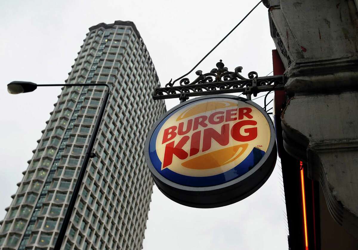 A sign hangs at a branch of Burger King in central London, Thursday, Jan. 24, 2013. Burger King says it has stopped buying beef from an Irish supplier whose patties in Britain and Ireland were found to contain traces of horsemeat. Officials say there is no risk to human health, but the episode has raised food security concerns. (AP Photo/Kirsty Wigglesworth)