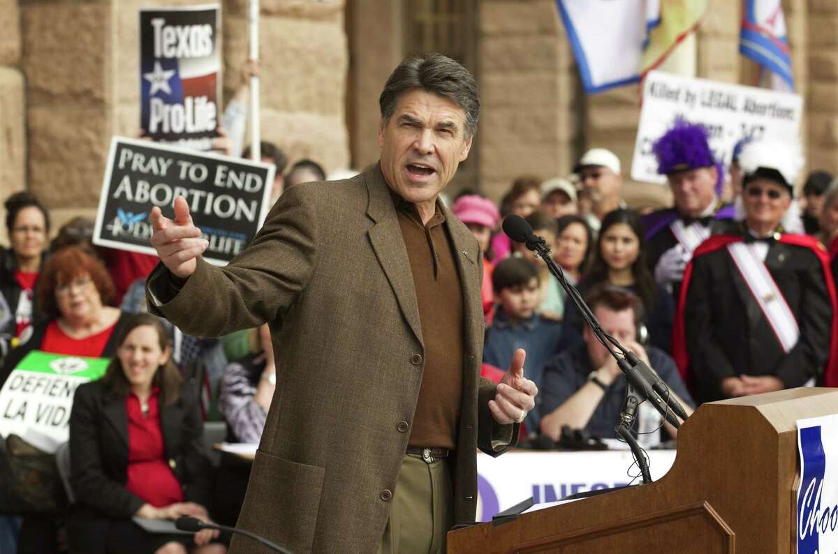 Gov. Rick Perry speaks during the Rally for Life at the Capitol in Austin, Texas, on Saturday, Jan. 26, 2013. Hundreds attended the pro-life rally that came on the heels of the 40th anniversary of the Roe v. Wade decision. Perry said Texas will do all it can to make abortions as rare as possible. (AP Photo/Austin American-Statesman, Jay Janner) MAGS OUT; NO SALES; INTERNET AND TV MUST CREDIT PHOTOGRAPHER AND STATESMAN.COM
