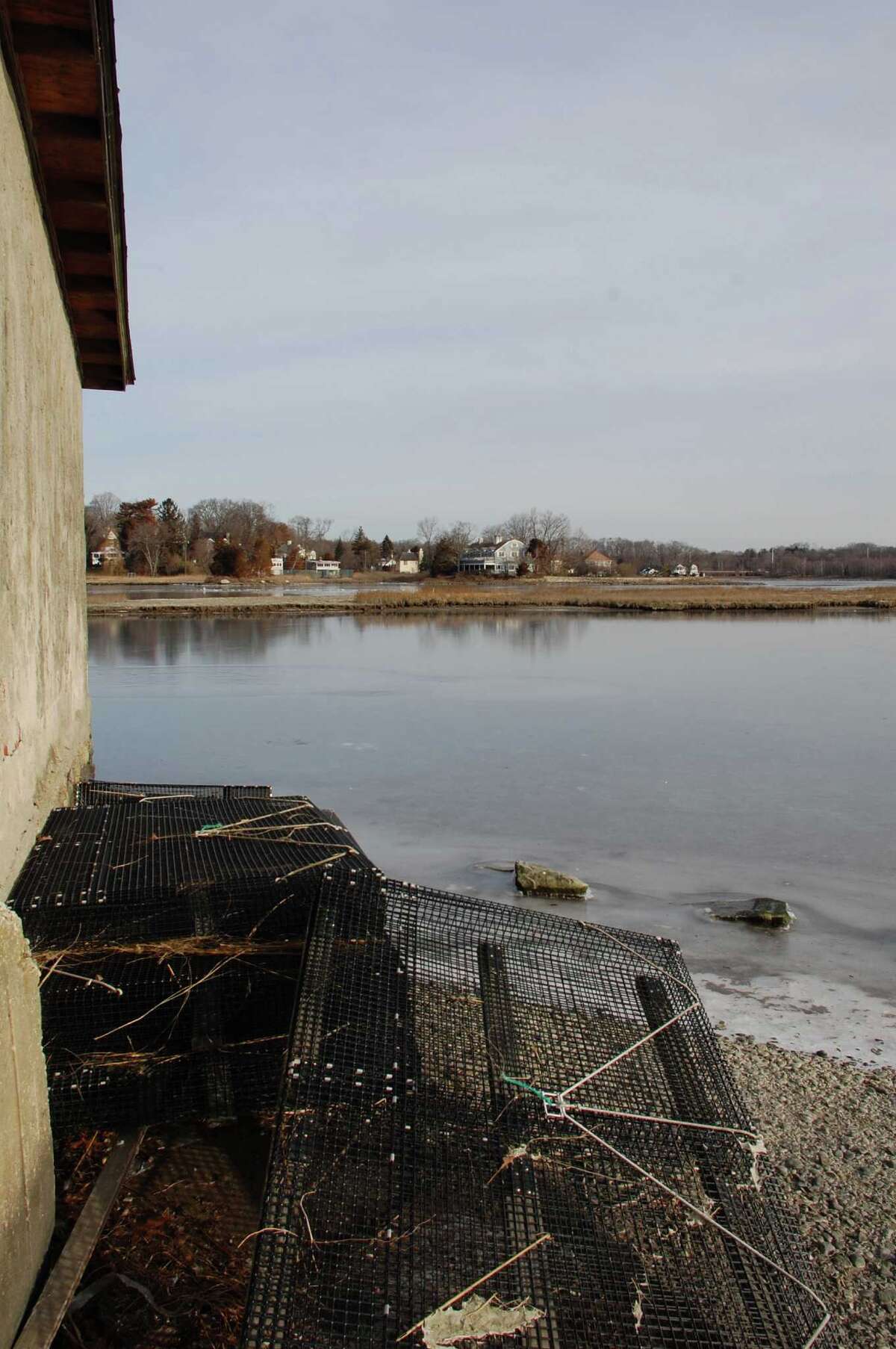 Slow cleansing of Sherwood Mill Pond hindered by sand buildup