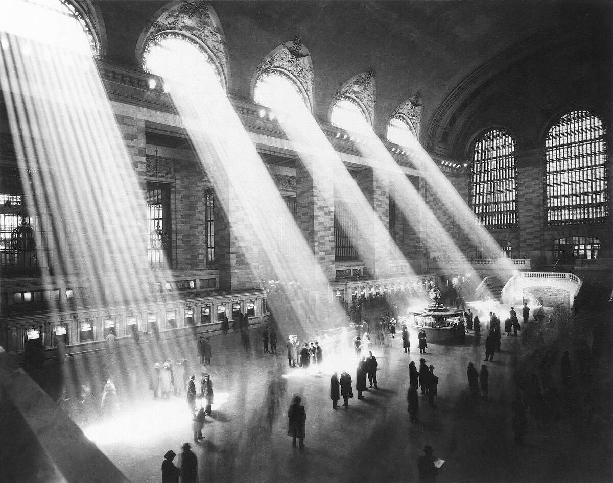 Sunlight streams through the windows in the concourse at Grand Central Terminal in New York City in 1954. The famed station turns 100 years-old in February 2013.