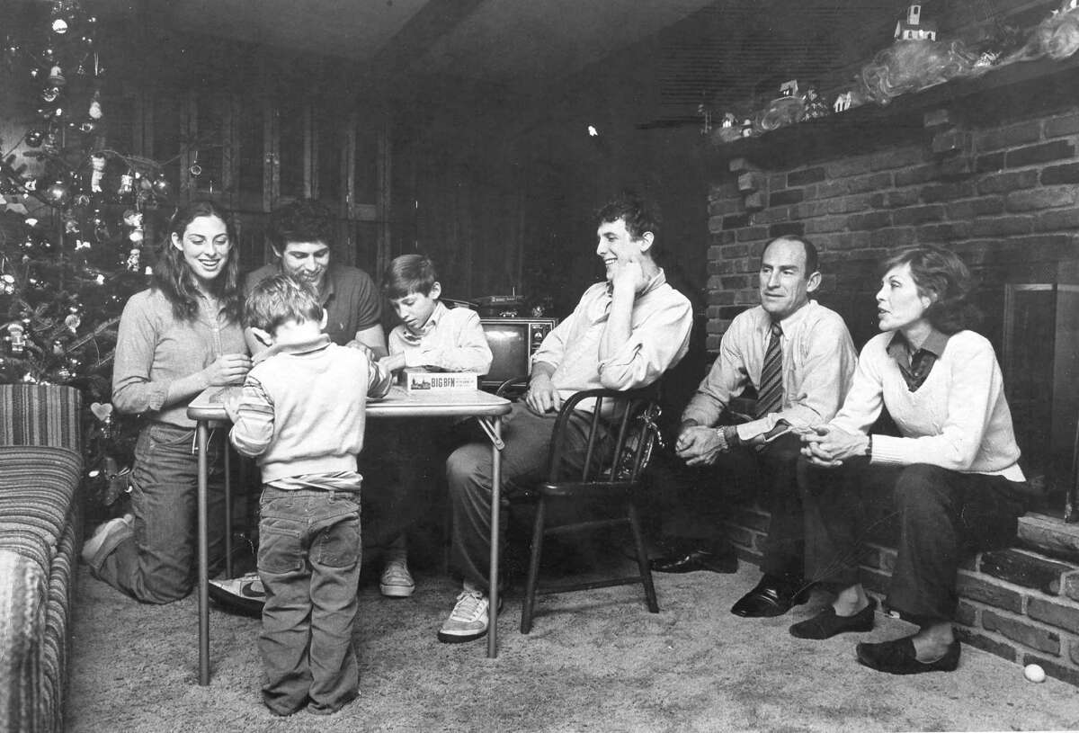 The Young family in their Greenwich home during the Christmas season in the early 1980s, from left, Melissa, Jim, Steve, Tom, Mike, LeGrande and Sherry.