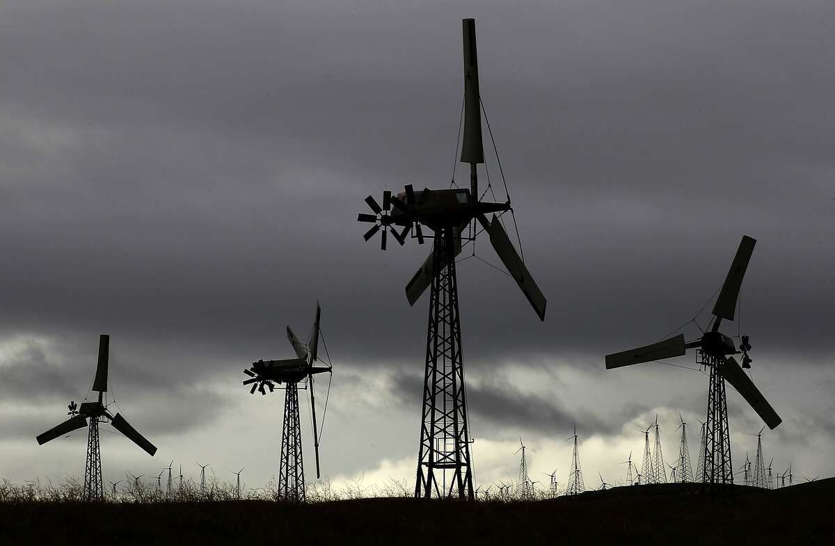 Wind generators dot the hills of Eastern Alameda County along the Altamont Pass in Livermore, Calif. on Wednesday Dec. 26, 2012.