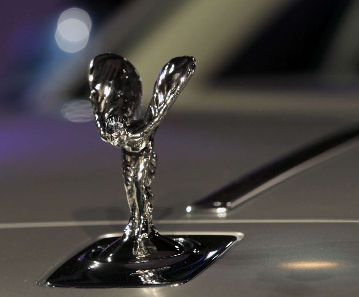 Spirit of Ecstasy: The hood ornament became a fixture of Rolls-Royces in the 1920s, but its history lies in a love story. John Scott Montagu, who was a friend of founder Charles Stewart Rolls, had a secret relationship with Eleanor Thornton. Thornton was later immortalized in the Spirit of Ecstasy. She died at sea years after the ornament first appeared on a Rolls-Royce. Source: Road & Track