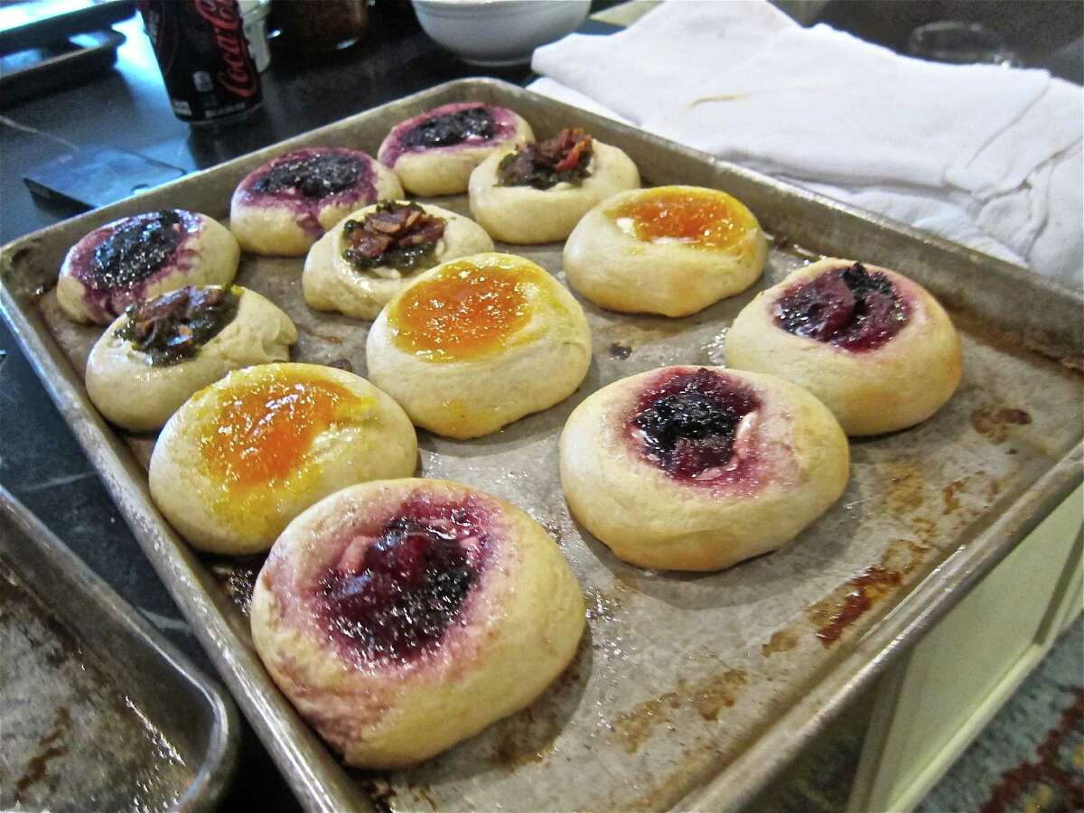 2. Know what you're eating  Stephen Harrigan, who journeyed across Texas to learn about kolaches, described them as "a springy mound of sweet dough with a declivity on top containing a dollop of some sort of fruit sprinkling on the streuseal-like popsika," in Texas Monthly. 