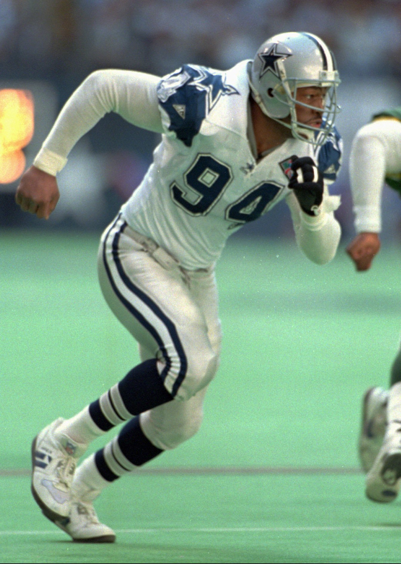 Emmitt Smith of the Dallas Cowboys pushes away Ken Norton Jr. #51 of  News Photo - Getty Images