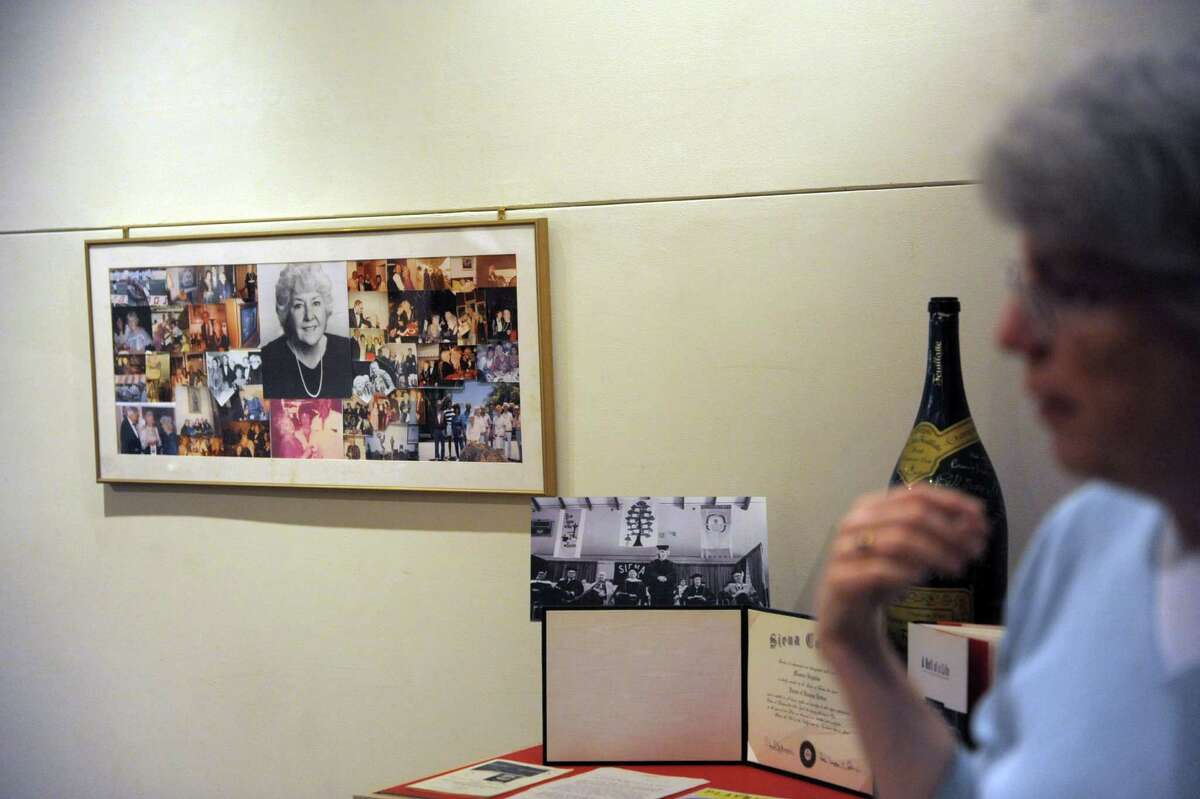 A photo collage of Maureen Stapleton with family and friends hangs on the wall at the Rensselaer County Historical Society on Wednesday, Jan. 30, 2013 in Troy, NY. The society is creating an exhibit entitled "Troy is My Home Town, The Life and Times of Maureen Stapleton", which opens Friday. (Paul Buckowski / Times Union)