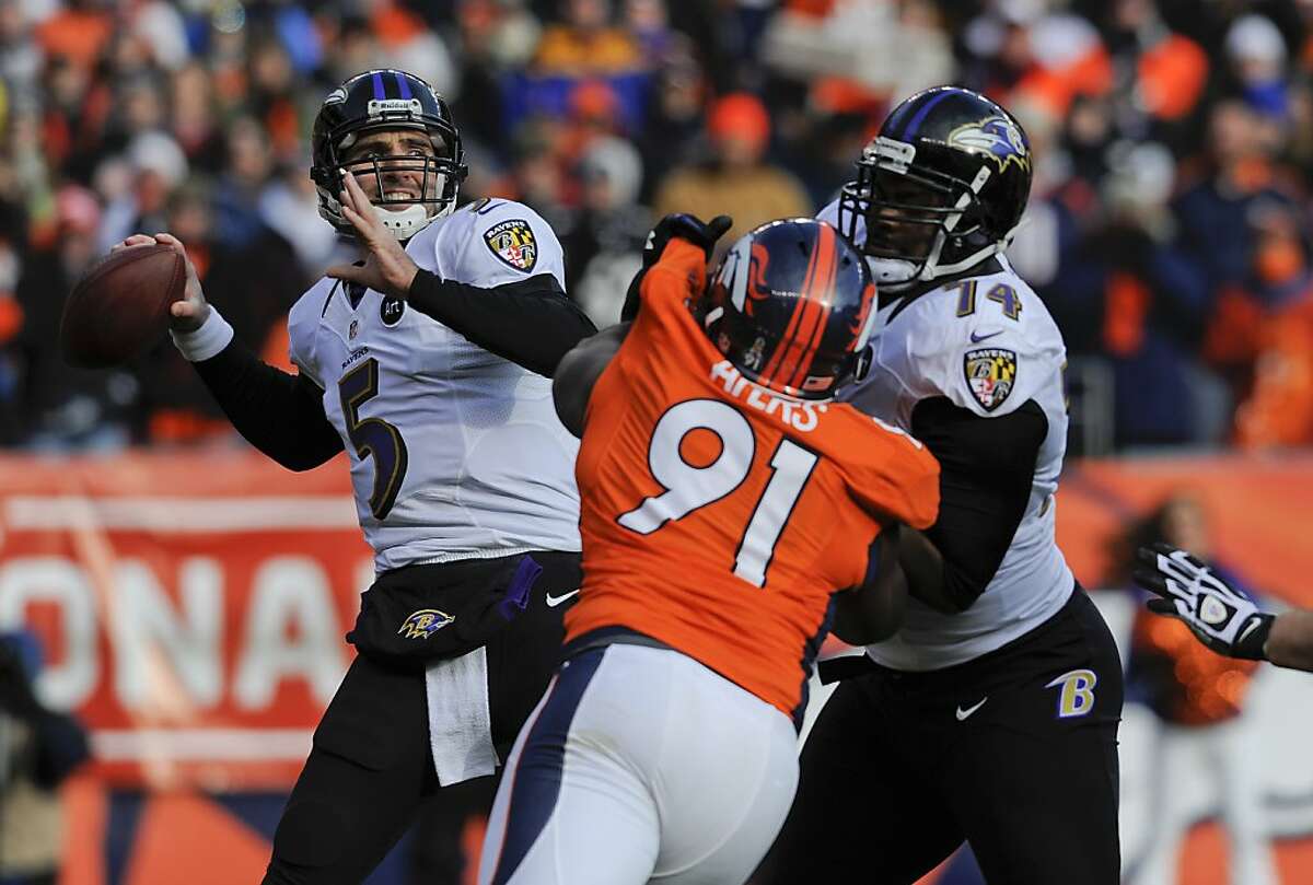 Baltimore Ravens quarterback Joe Flacco (5) steps back to pass as tackle Michael Oher (74) blocks Denver Broncos defensive end Robert Ayers (91) in the first quarter of an AFC divisional playoff NFL football game, Saturday, Jan. 12, 2013, in Denver. (AP Photo/Jack Dempsey)