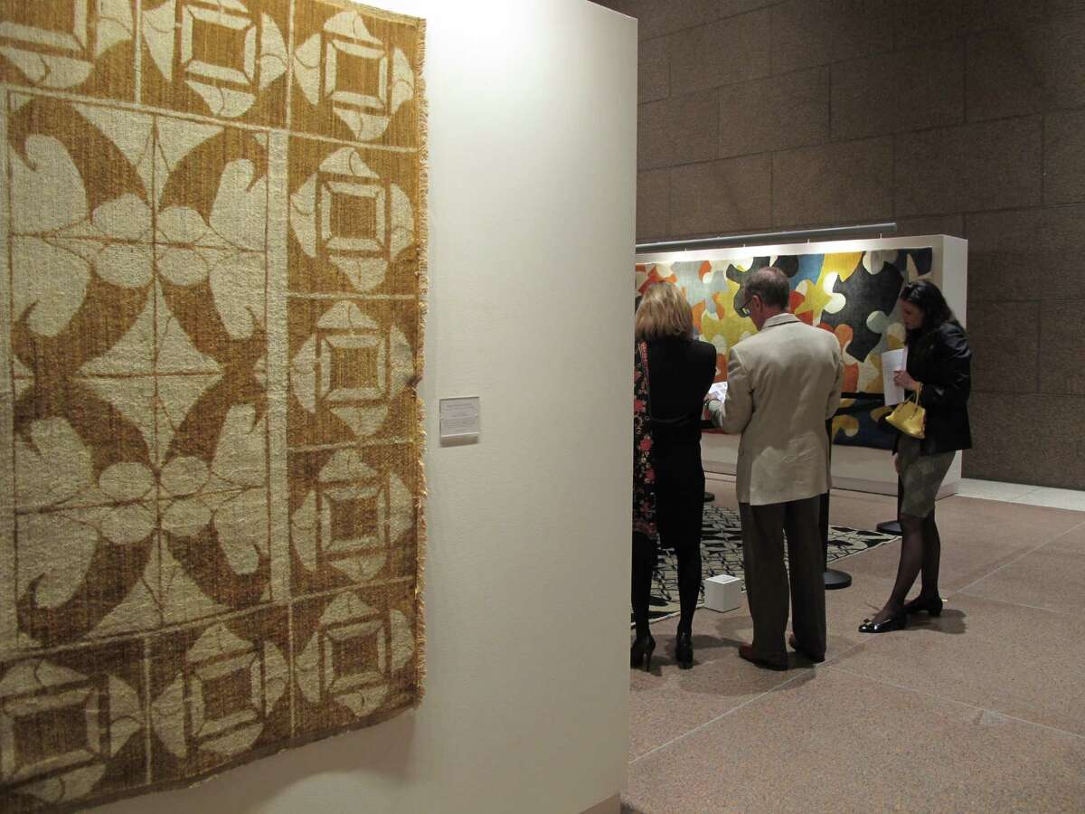 The Arzu Master's Collection, on display at the Bank of America building through Feb. 15, features rugs designed by international architects, including Frank Gehry, Margaret McCurry, Zaha Hadid and Micheal Graves and crafted by Afghan women.