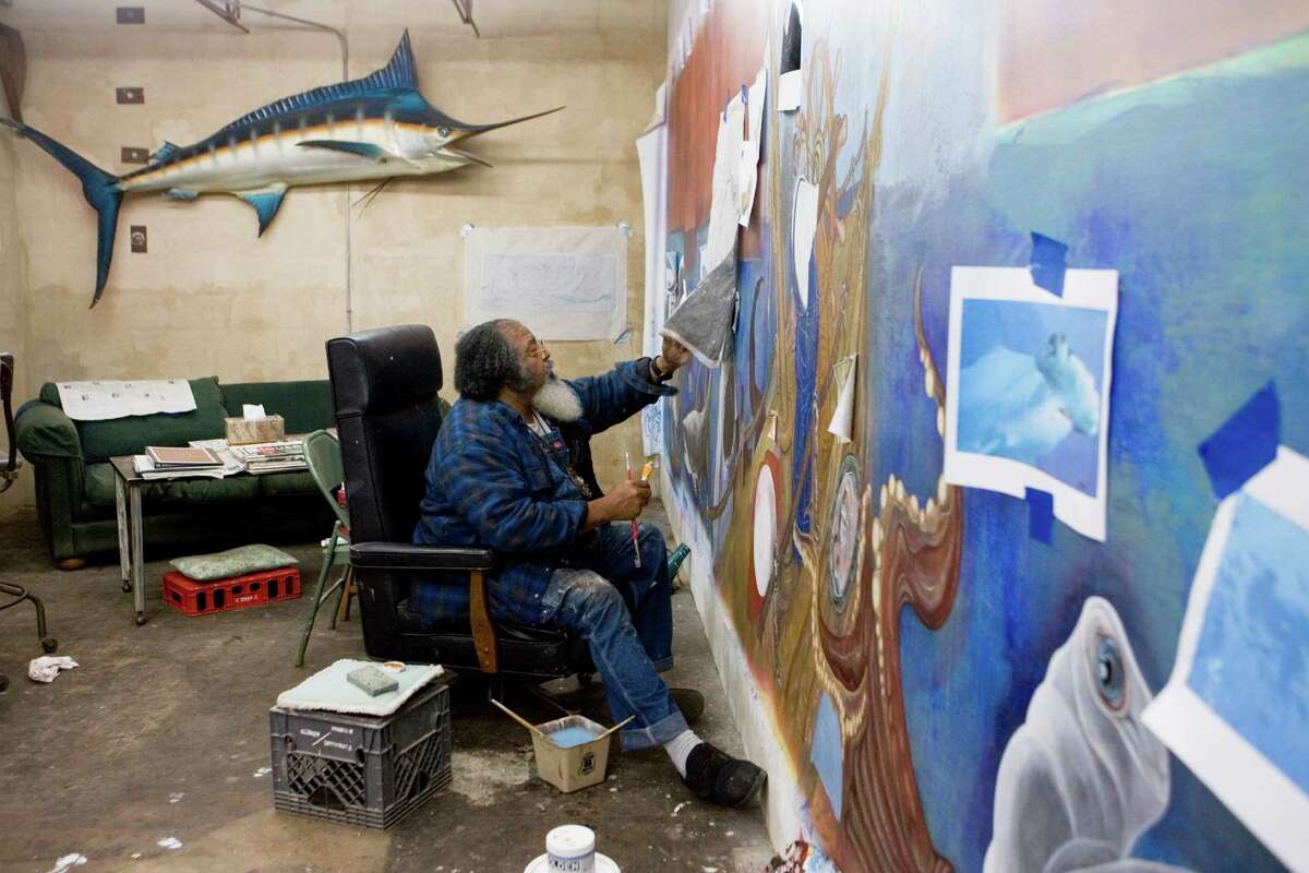 Artist Bert Long, 67, works on a mural in his studio Tuesday, Nov. 27, 2007, in Houston. The mural his is calling Art/Life is slated to be installed at the Looscan Public Library when it is finished. ( Brett Coomer / Chronicle )