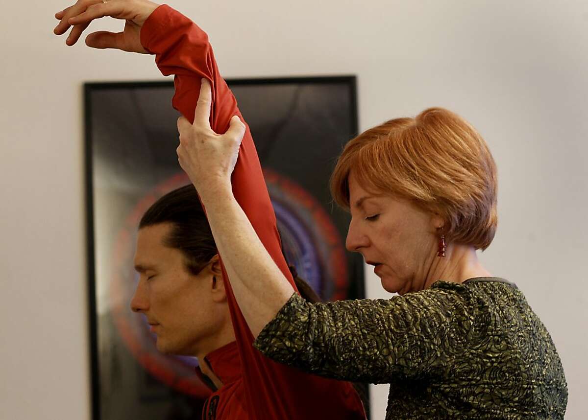 Linda Wobeskya (right) worked the arm of Brian Theard in her offices. Physical therapist Linda Wobeskya is a Zero Balancing therapist in Mill Valley, Calif. Zero Balancing is a mind-body healing technique which incorporates both eastern and western wellness techniques.