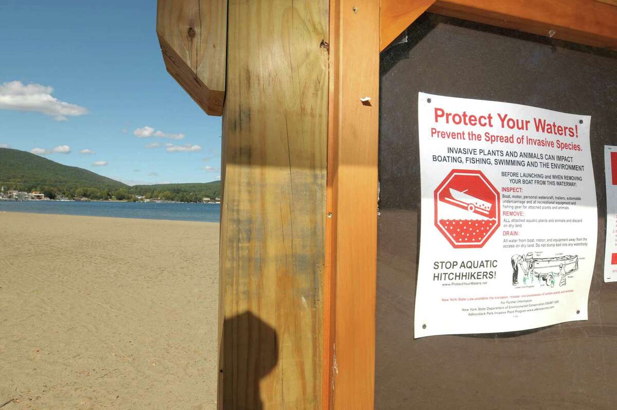 A sign is posted near a boat launch on the south end of Lake George to inform boaters to help prevent the spread of invasive species, Thursday, Sept. 20, 2012, in Lake George, NY. (Paul Buckowski / Times Union archive)