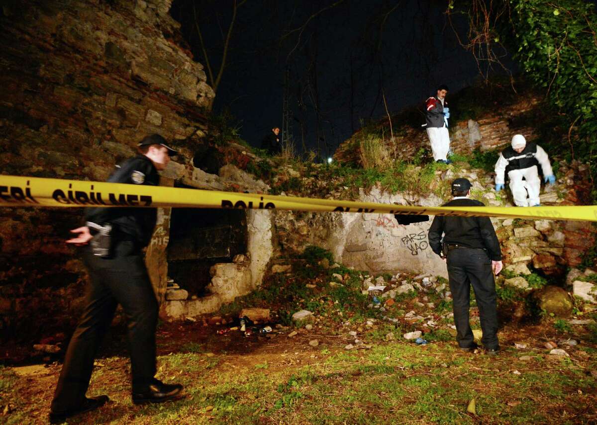 Police forensics search for missing New York City woman Sarai Sierra near the remnants of some ancient city walls in low-income district of Sarayburnu in Istanbul, Turkey, late Saturday, Feb. 2, 2013. Turkey's state-run news agency said that she has been found dead in Istanbul and police have detained nine people in connection with the case. Sierra, a 33-year-old mother of two, went missing while vacationing alone in Istanbul. Her body was discovered late Saturday amid the city walls.(AP Photo)