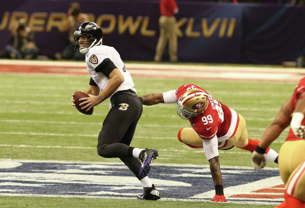 Ravens quarterback Joe Flacco consistently showed an ability to avoid the 49ers' pass rush, provided by Aldon Smith on this play.
