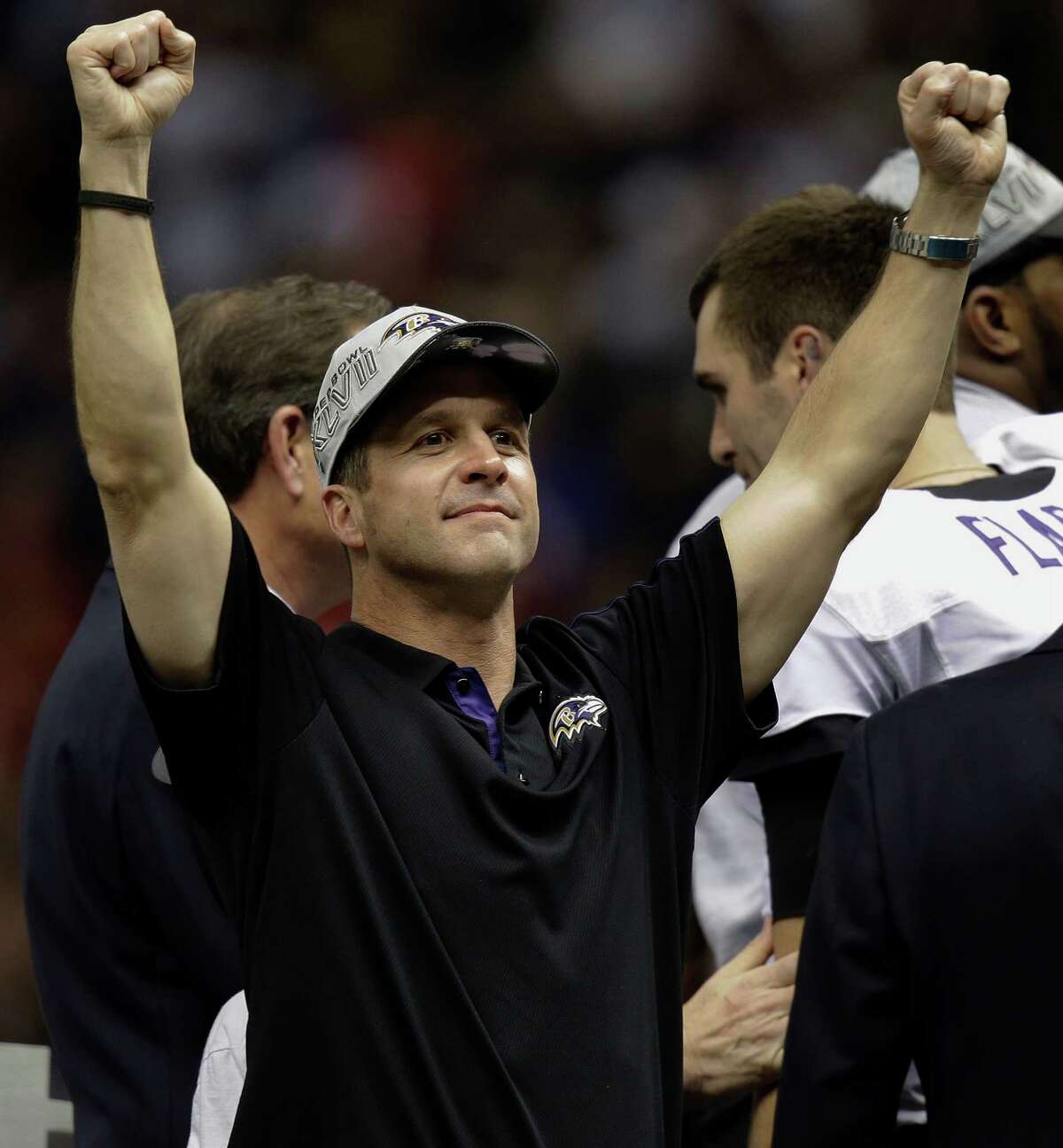 Older Harbaugh brother gets win in title game