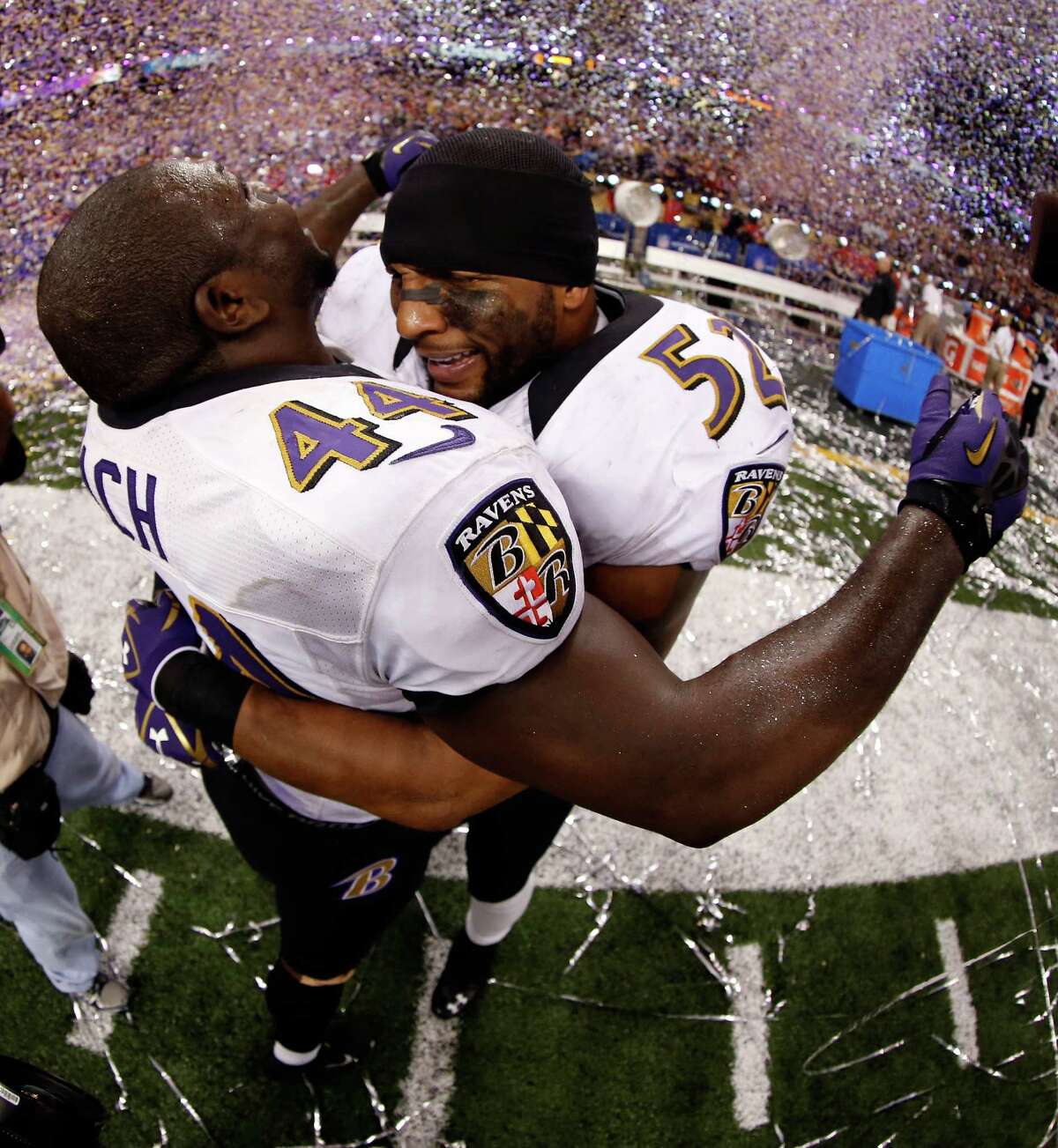 Ravens linebacker Ray Lewis (52) ended his career with a second Super Bowl crown, which he celebrated with ex-Texan Vonta Leach.
