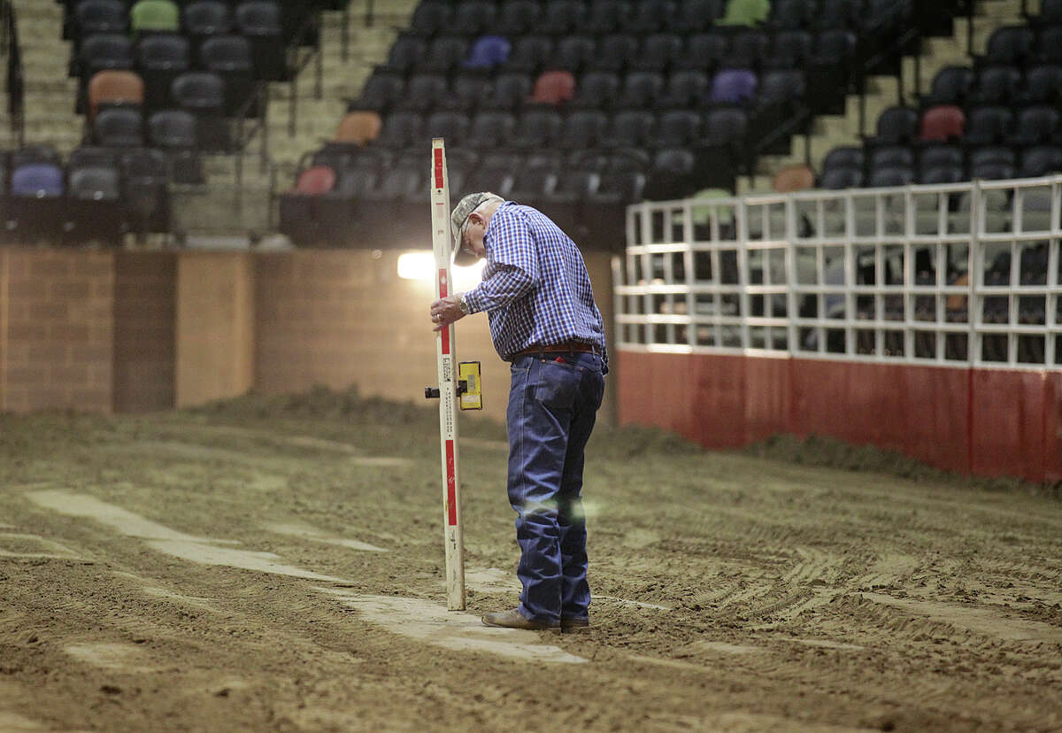 Tons of top soil are moved into the AT&T Center, Monday, Feb. 4, 2013, in preparations for the San Antonio Stock Show & Rodeo. The stock show and rodeo starts on Thursday, Feb. 7 and runs through Feb. 24.