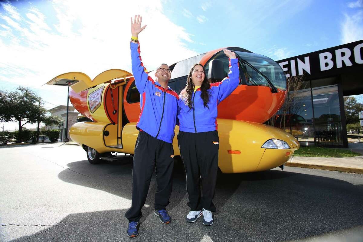 For Abraham Luna and Emma Cuellar, driving the Oscar Mayer Wienermobile, seen here on Kirby, is a once-in-a-lifetime gig.
